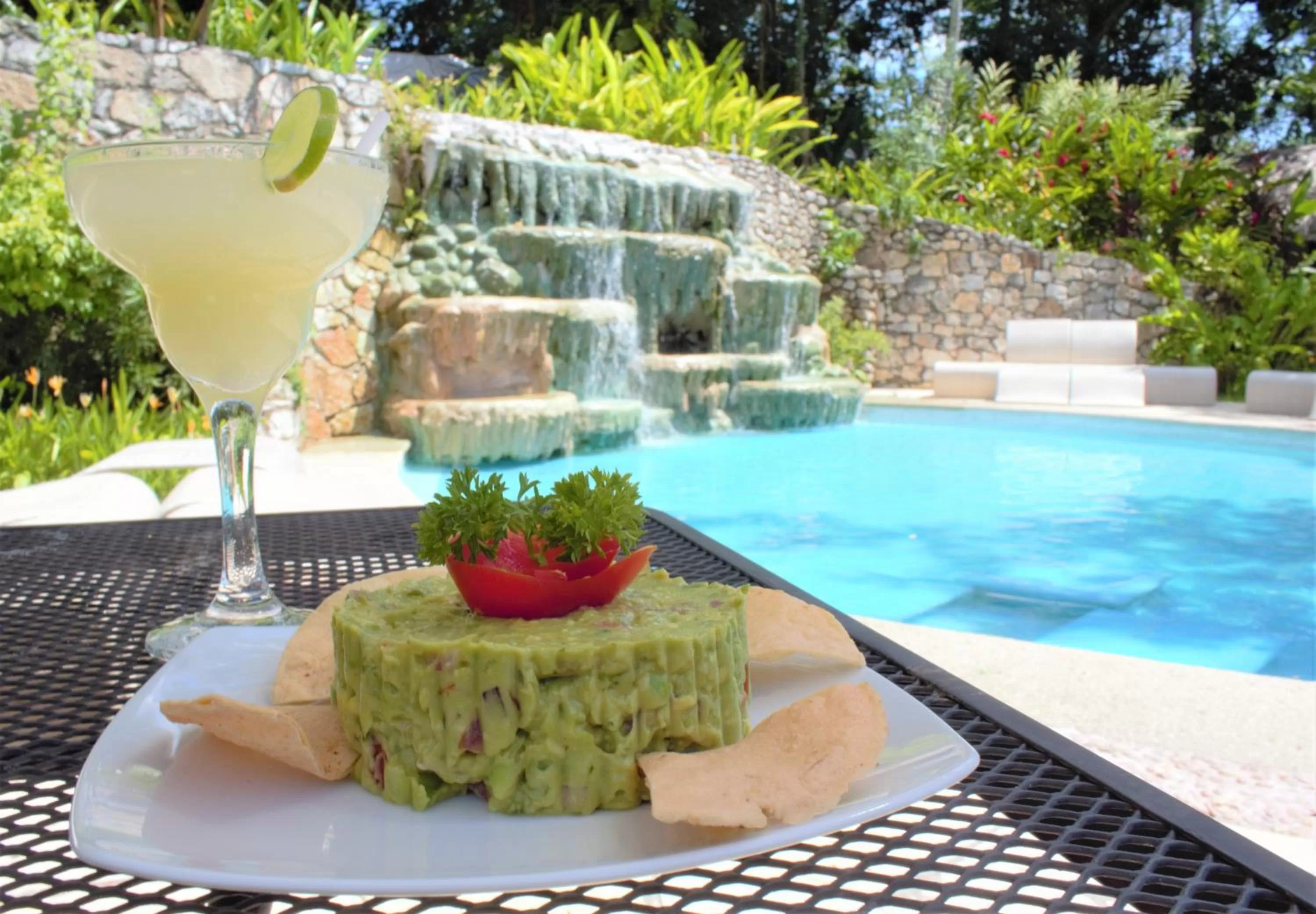 Swimming pool in Hotel La Aldea del Halach Huinic