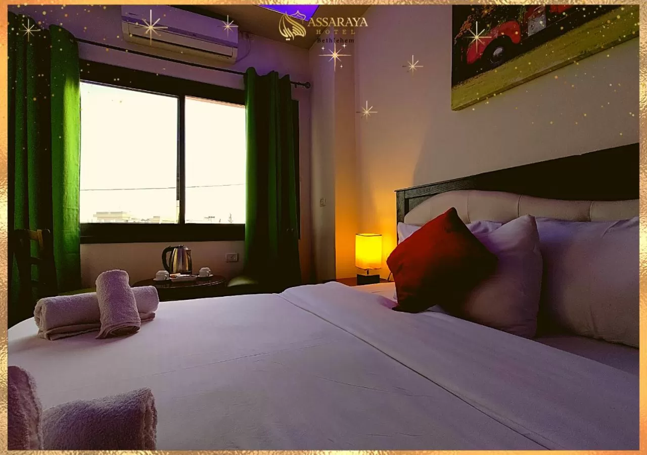 Bed in Assaraya Palace Hotel