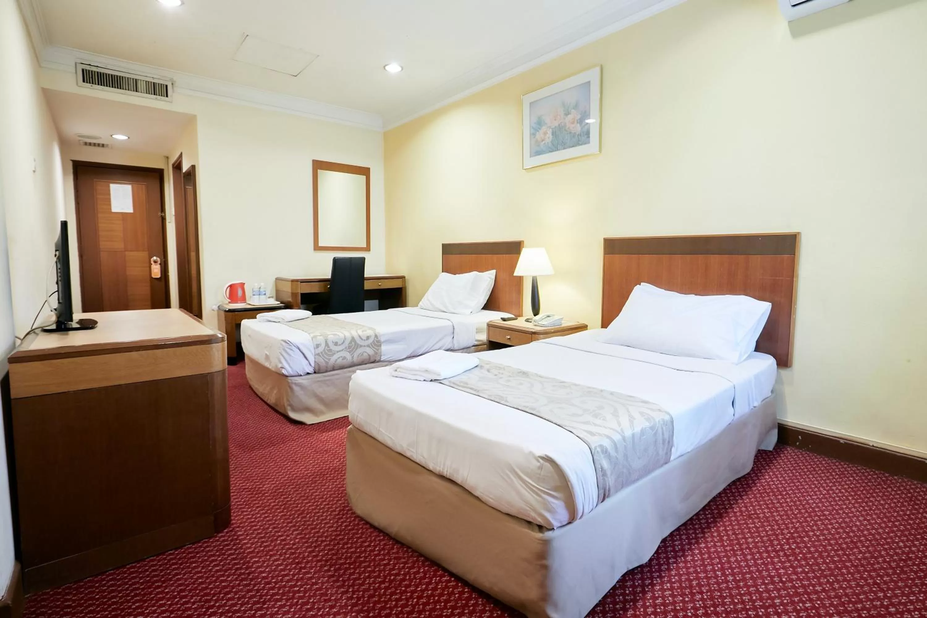 Bed in Grand Pacific Hotel PWTC