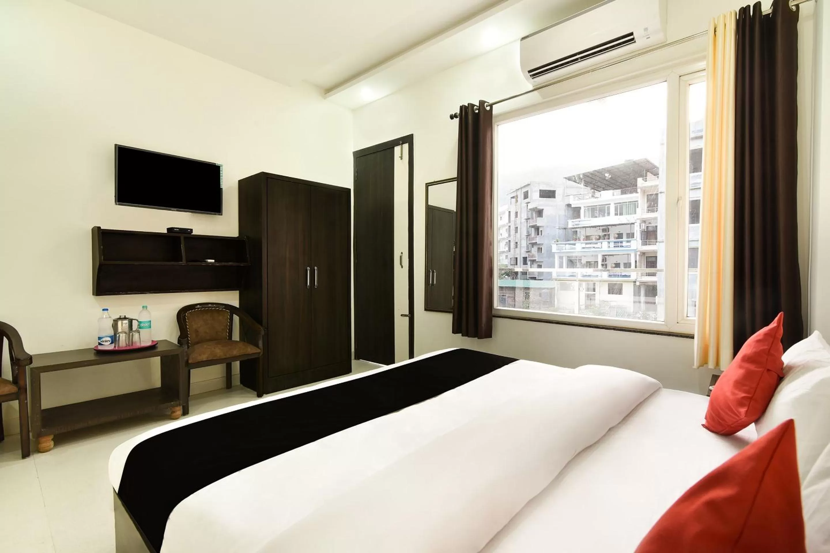 Bedroom, Bed in Capital O Yogasthali Inn Hotel And Spa