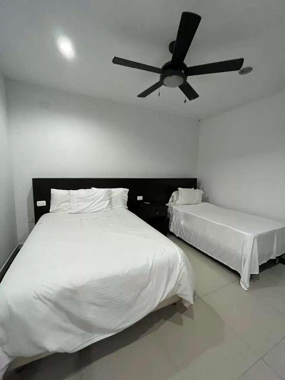 Basic Triple Room - single occupancy in Serenity Suites Casa Boutique Basic Triple Room - single occupancy in Serenity Suites Casa Boutique