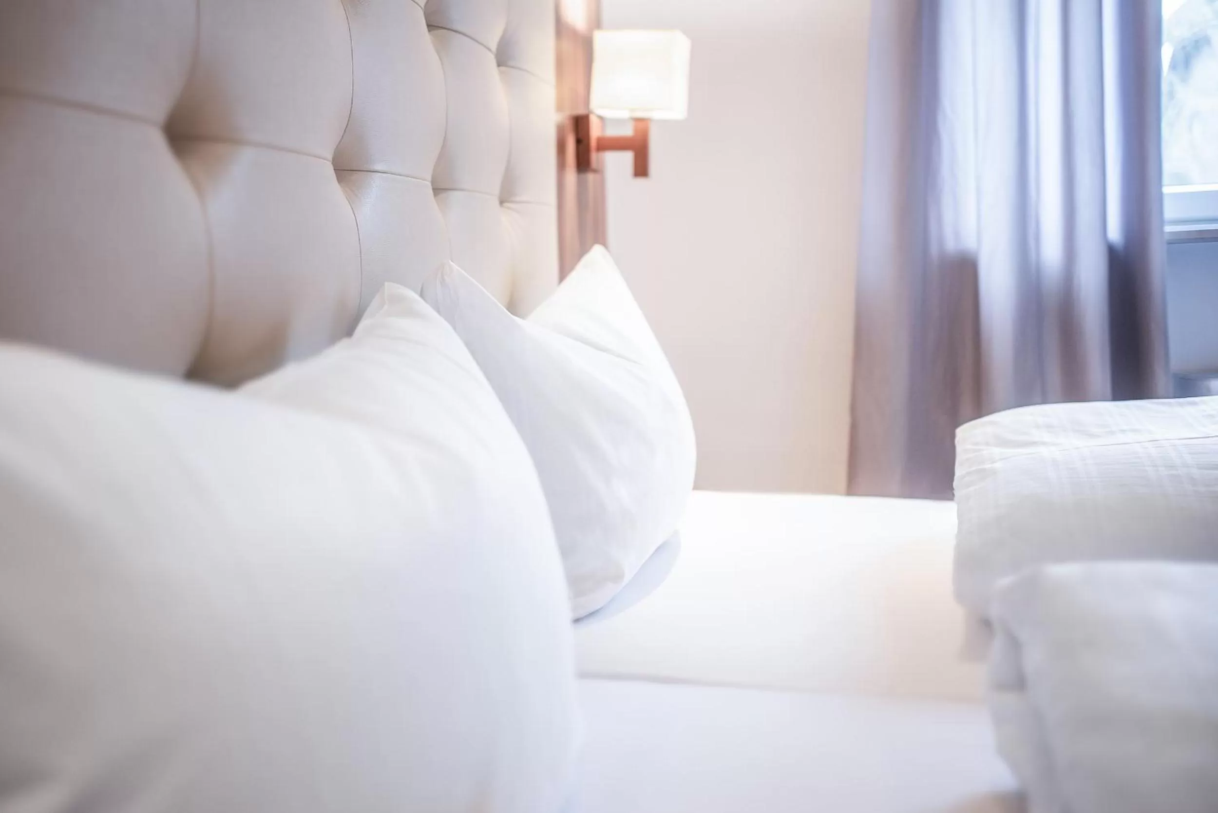 Bed in Hotel Ehranger Hof