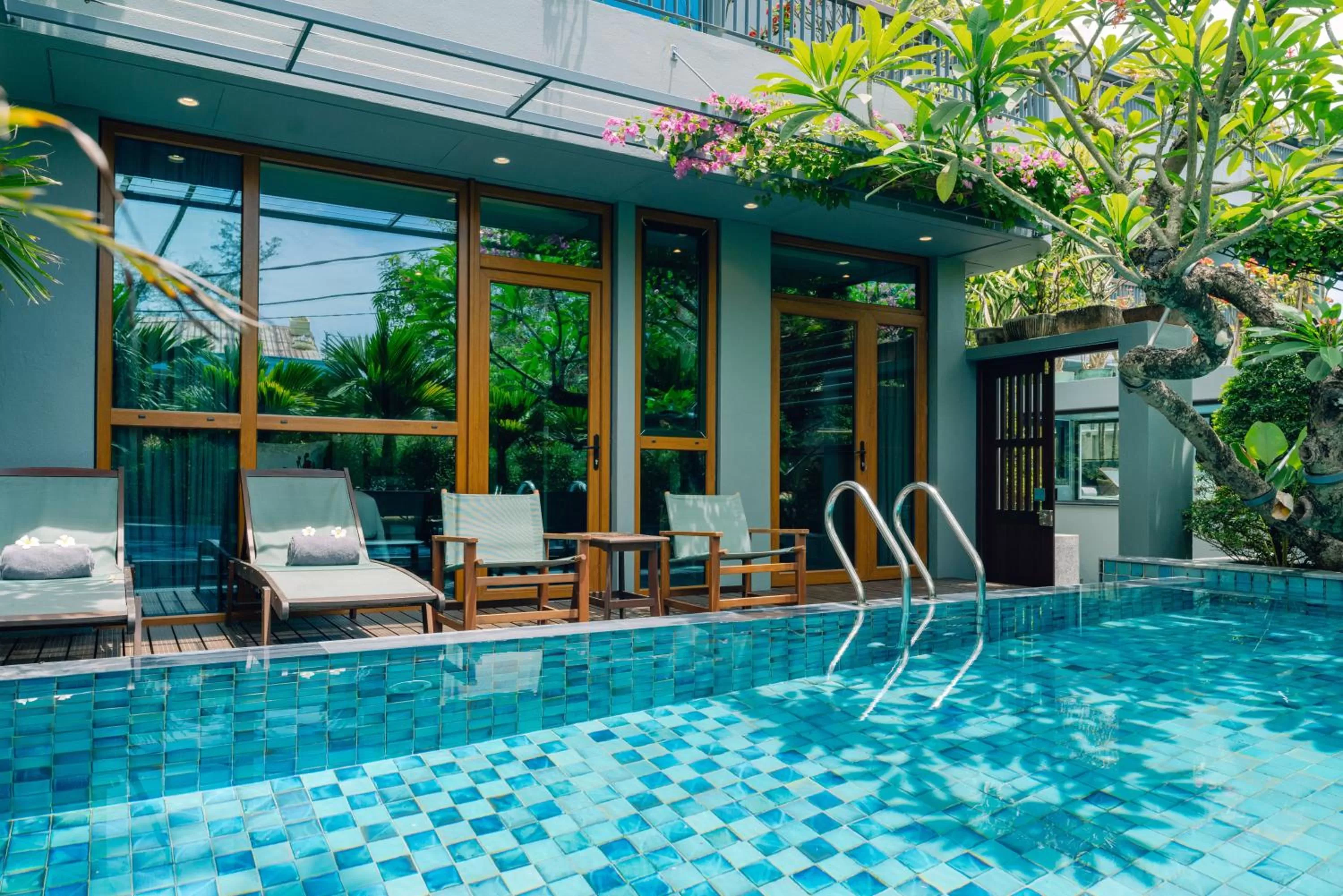 Swimming pool in CHiEM HoiAn - The Beachside Boutique Hotel & Villa