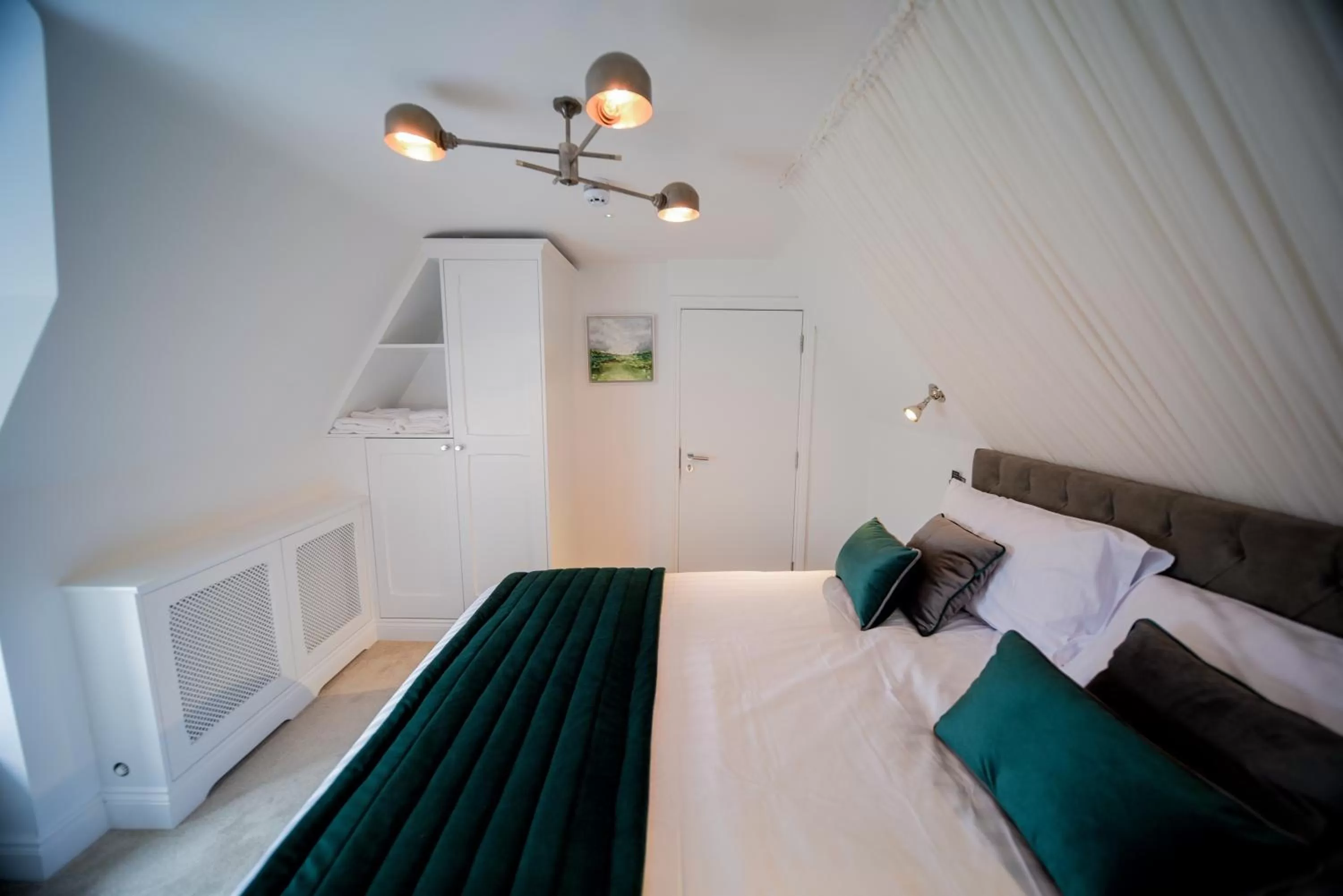 Photo of the whole room, Bed in The Strand Hotel, the former residence of Oscar Wilde