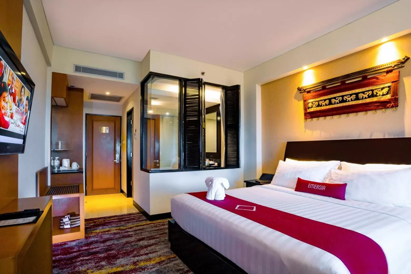 Bed in Emersia Hotel and Resort