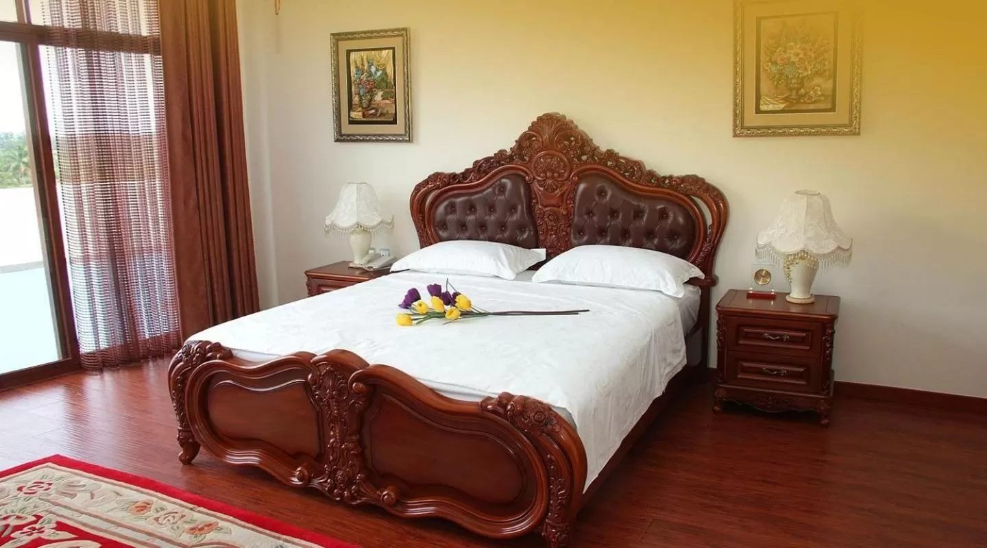 Bed in Victoria Beach Hotel