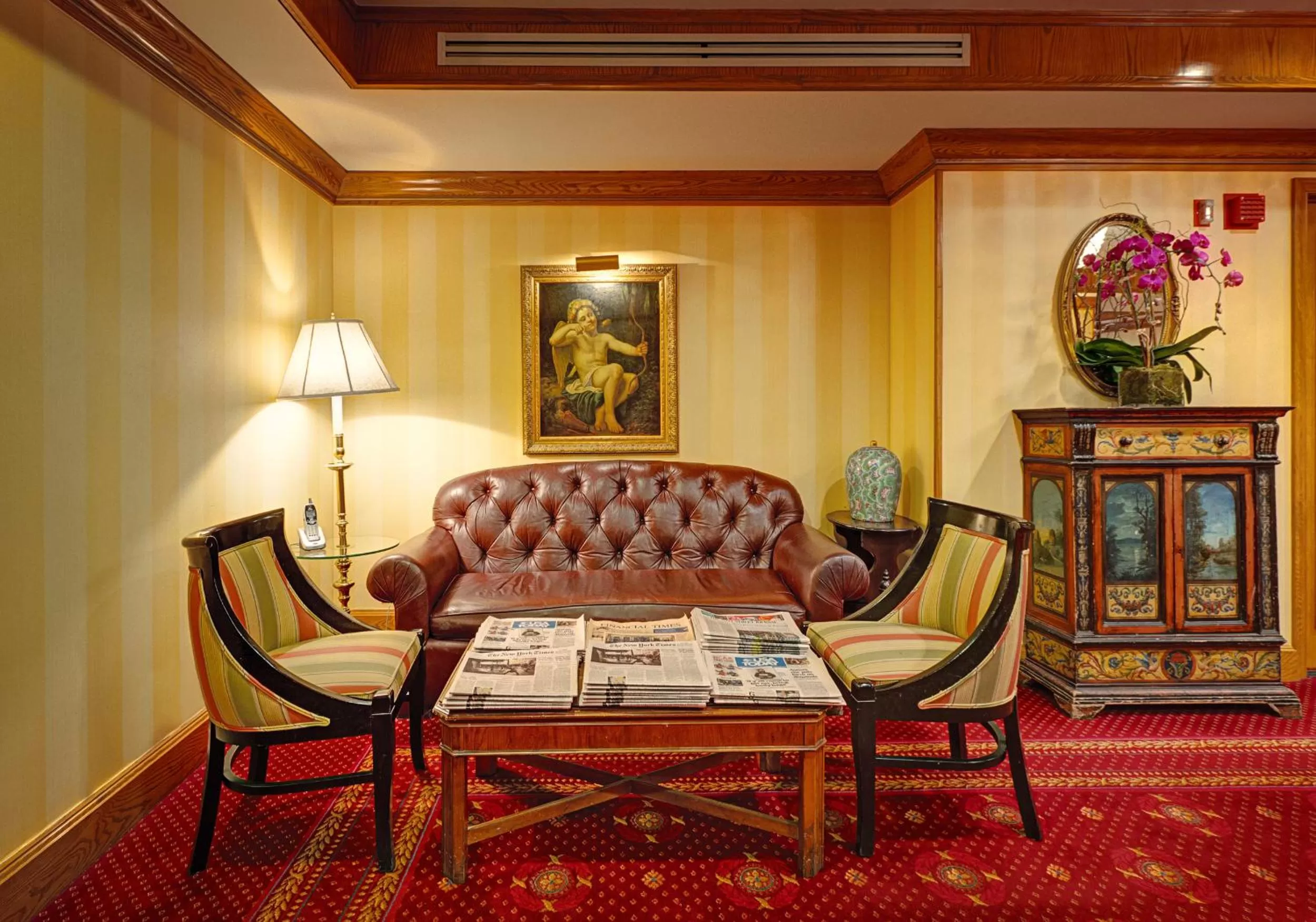 Living room in Hotel Elysee by Library Hotel Collection