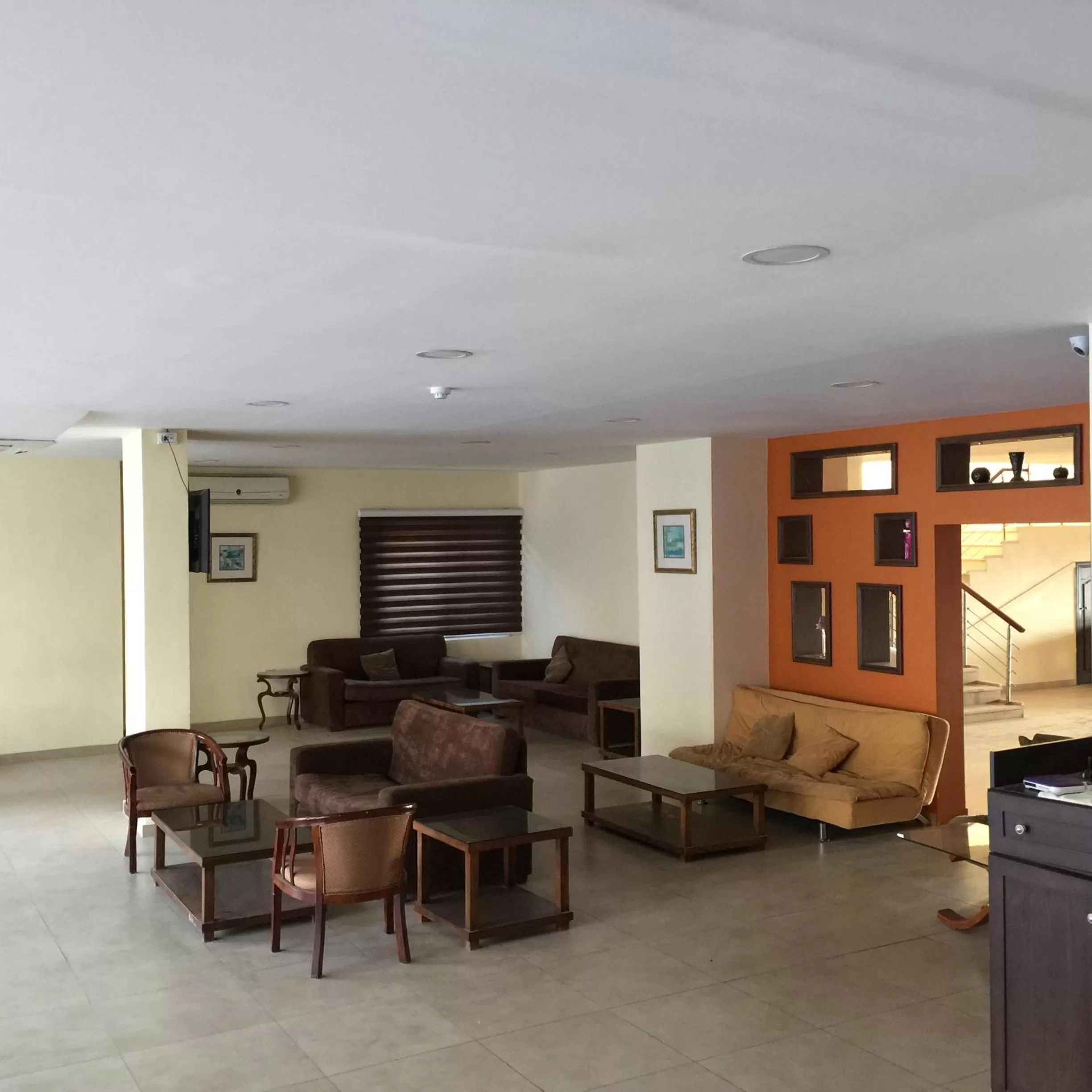 Communal lounge/ TV room in Zaina Plaza Hotel