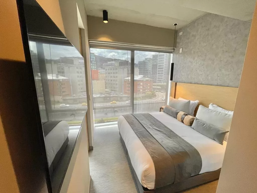 Bedroom, Bed in ICON 100 Luxury Apartasuites