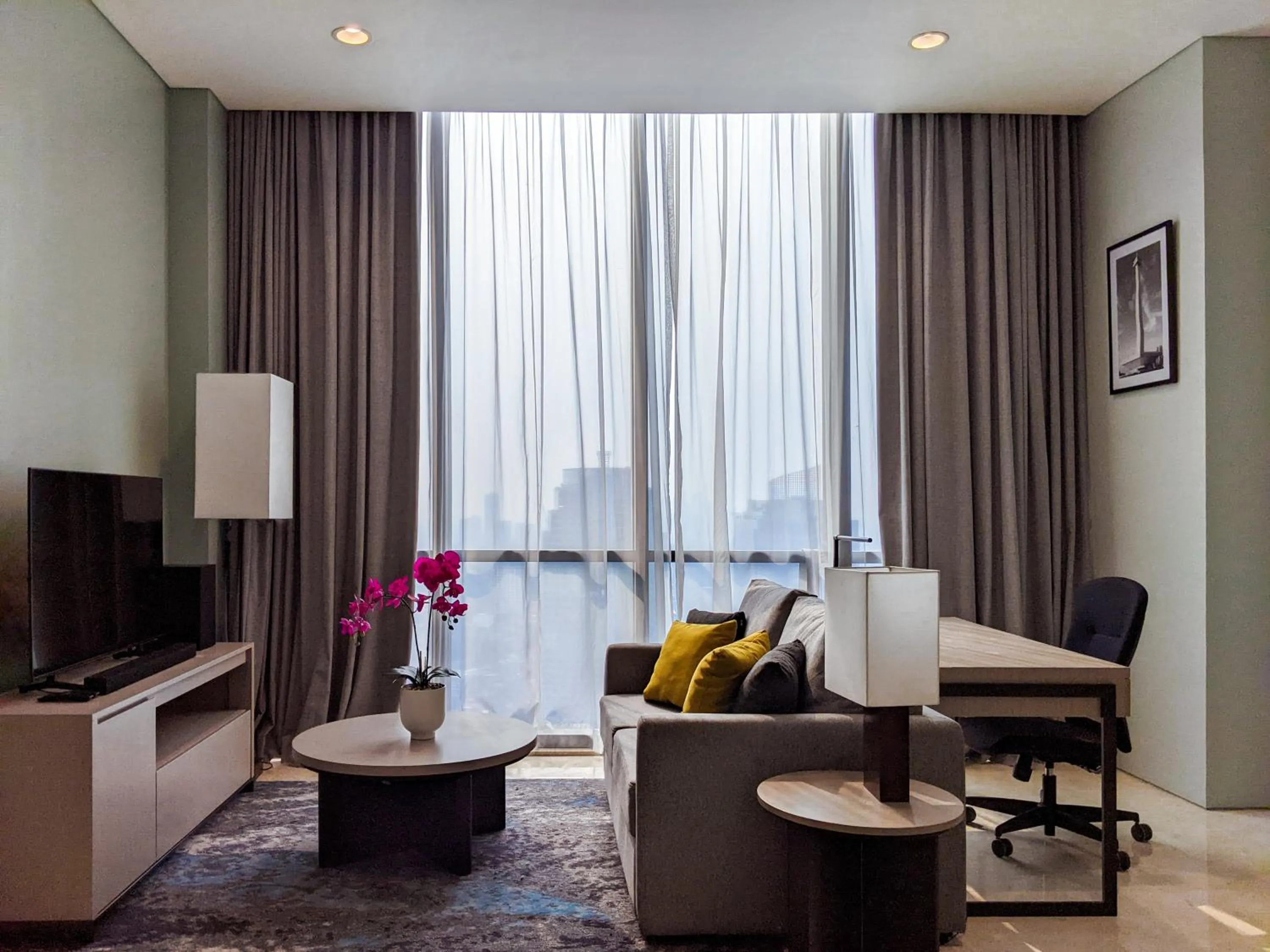 Living room, Seating Area in Crowne Plaza Jakarta Residences, an IHG Hotel