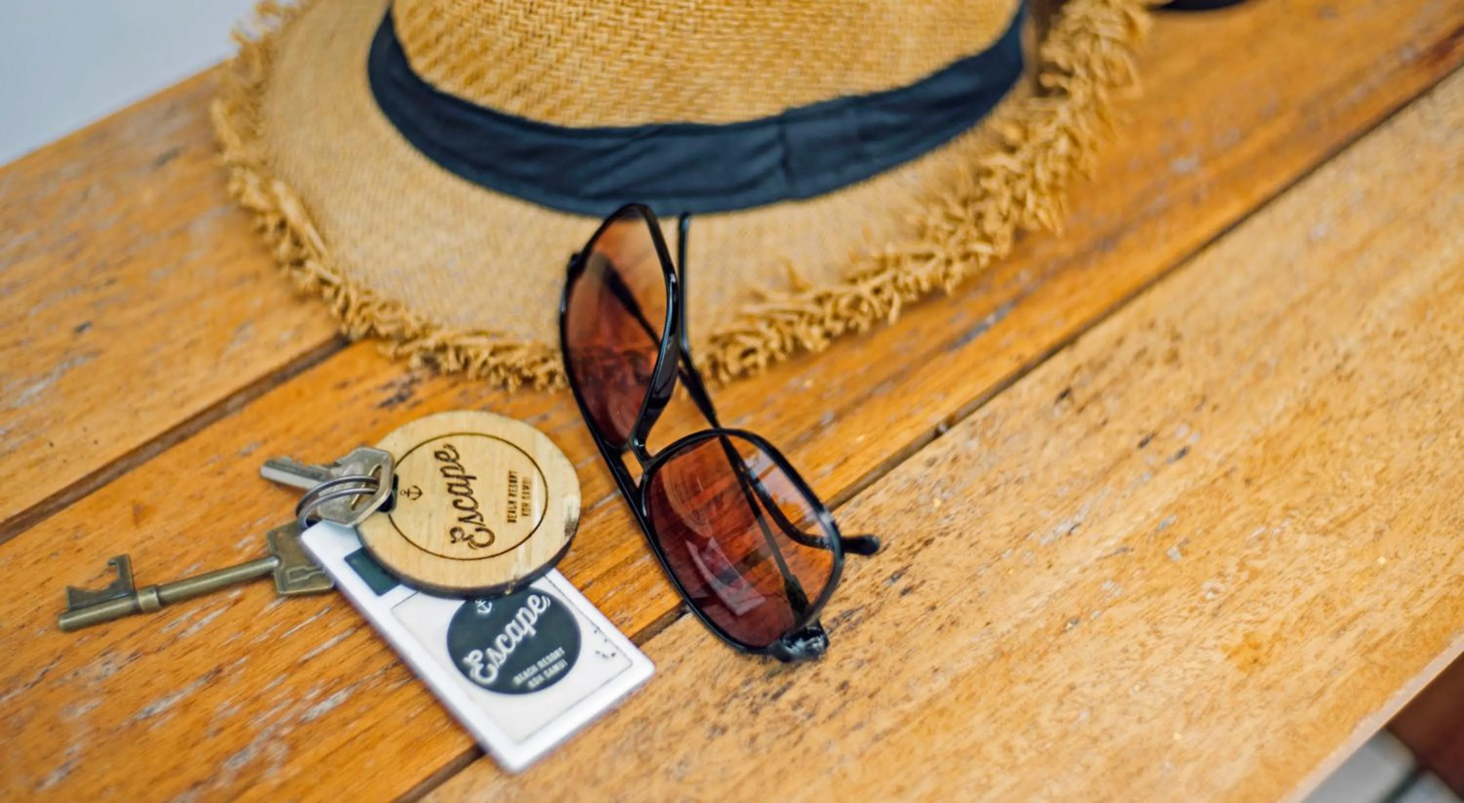 Property logo or sign in Escape Beach Resort - New Look & Improved