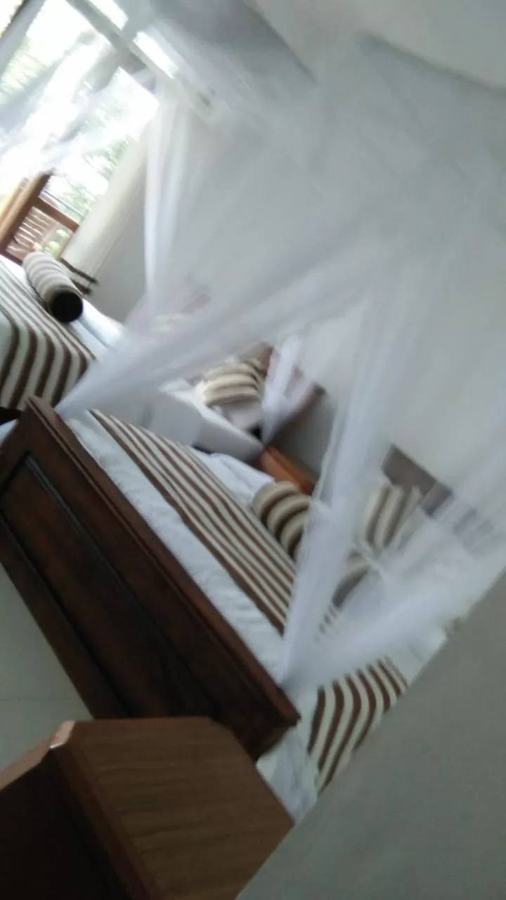 Bed in Maple Home Stay