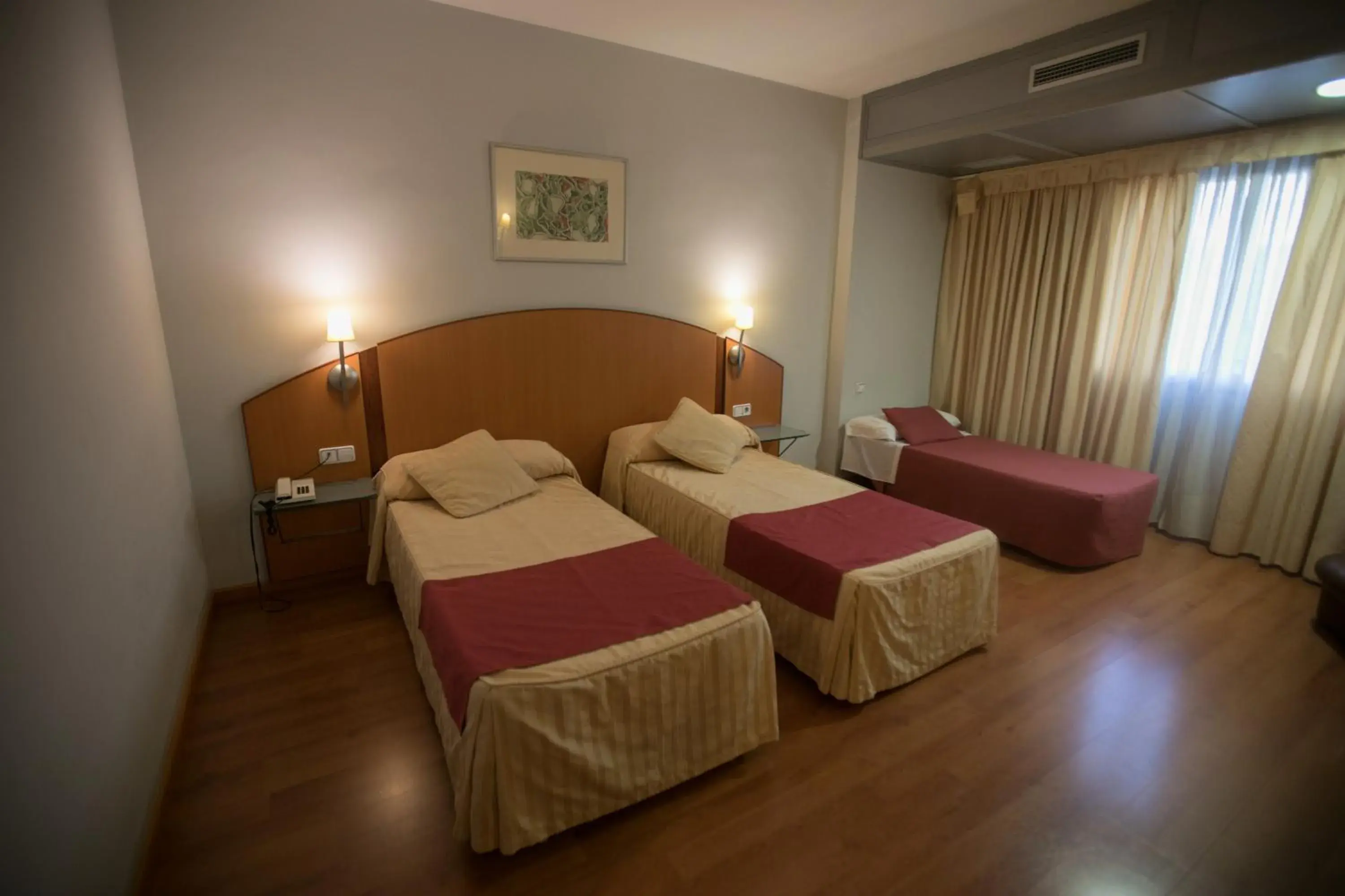 Triple Room in Hotel Reconquista Triple Room in Hotel Reconquista