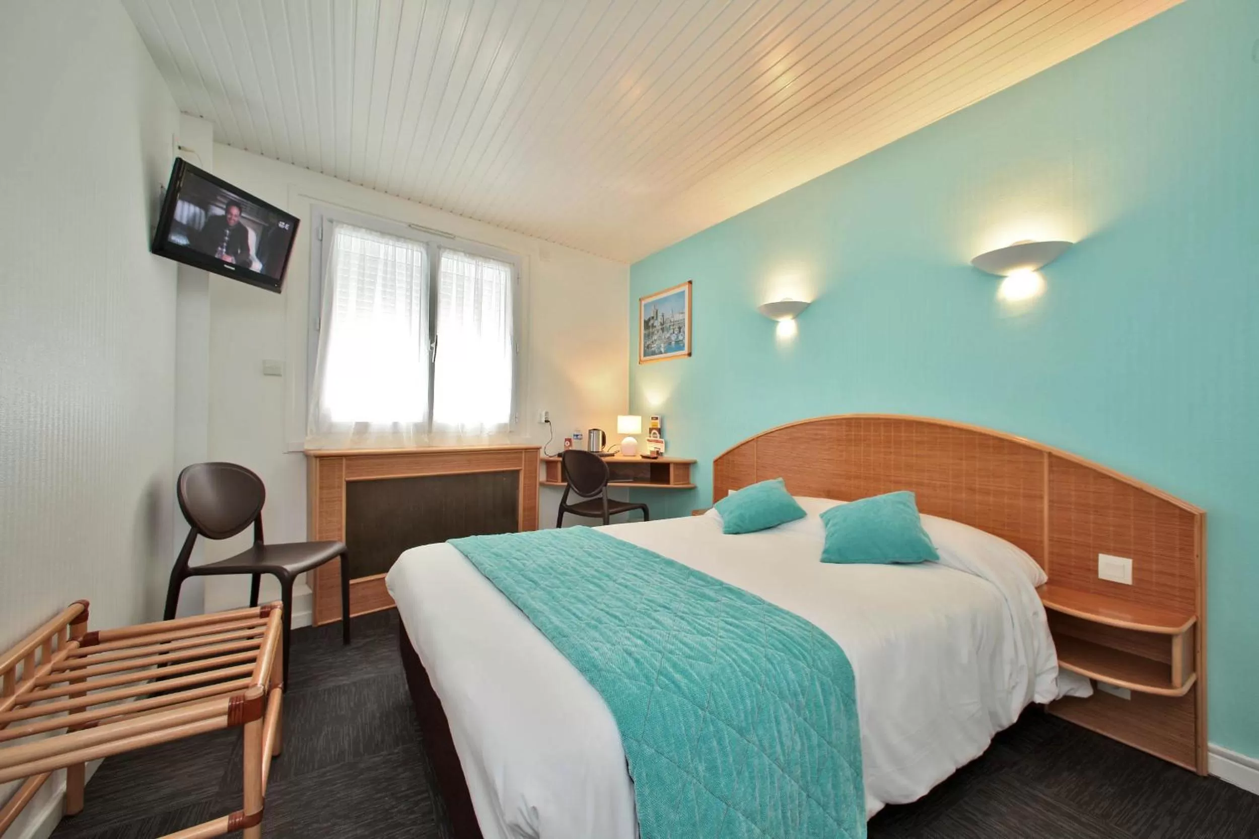 Bed in Hotel Les Dunes