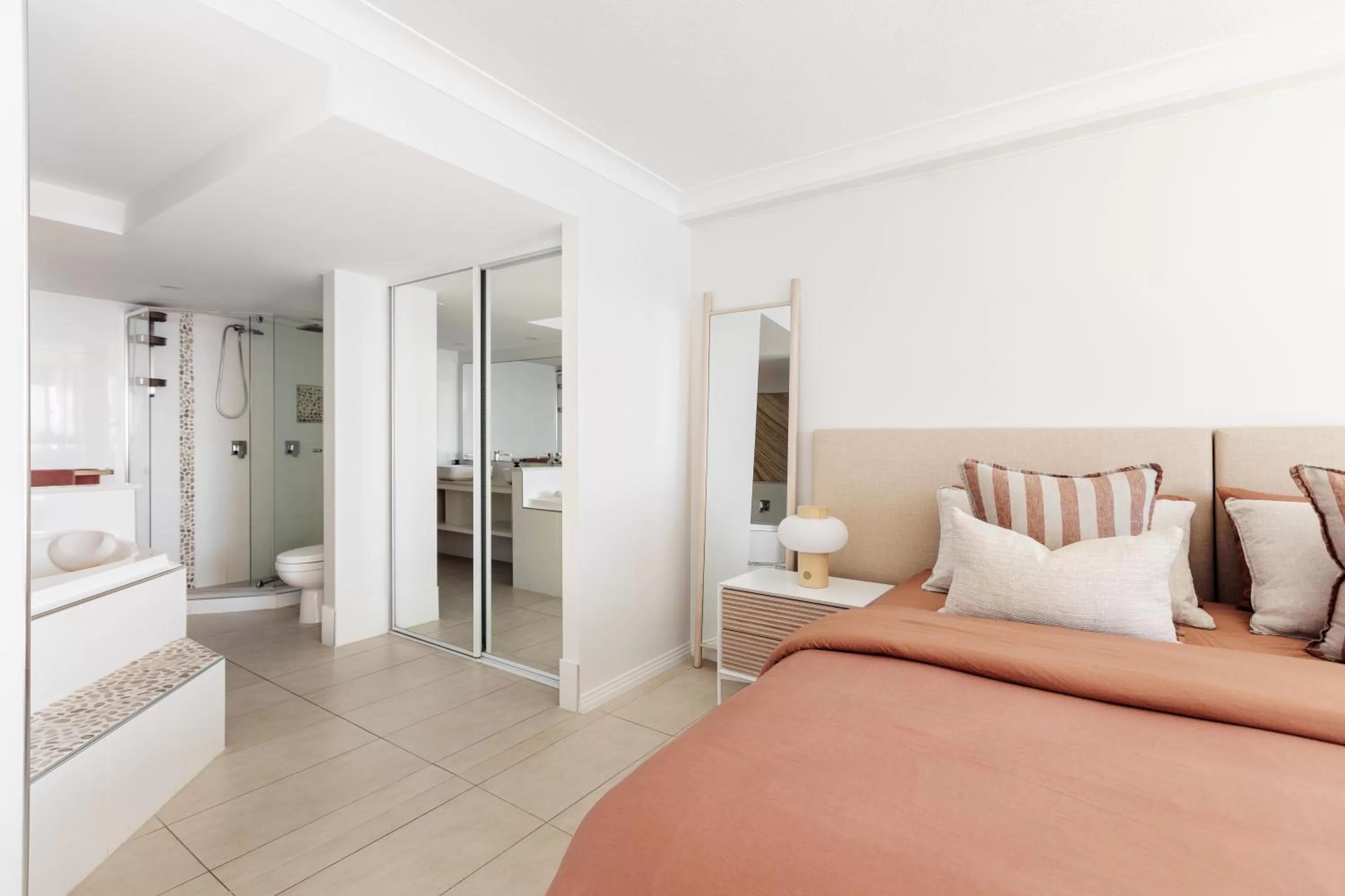 Bed in De Ville Apartments