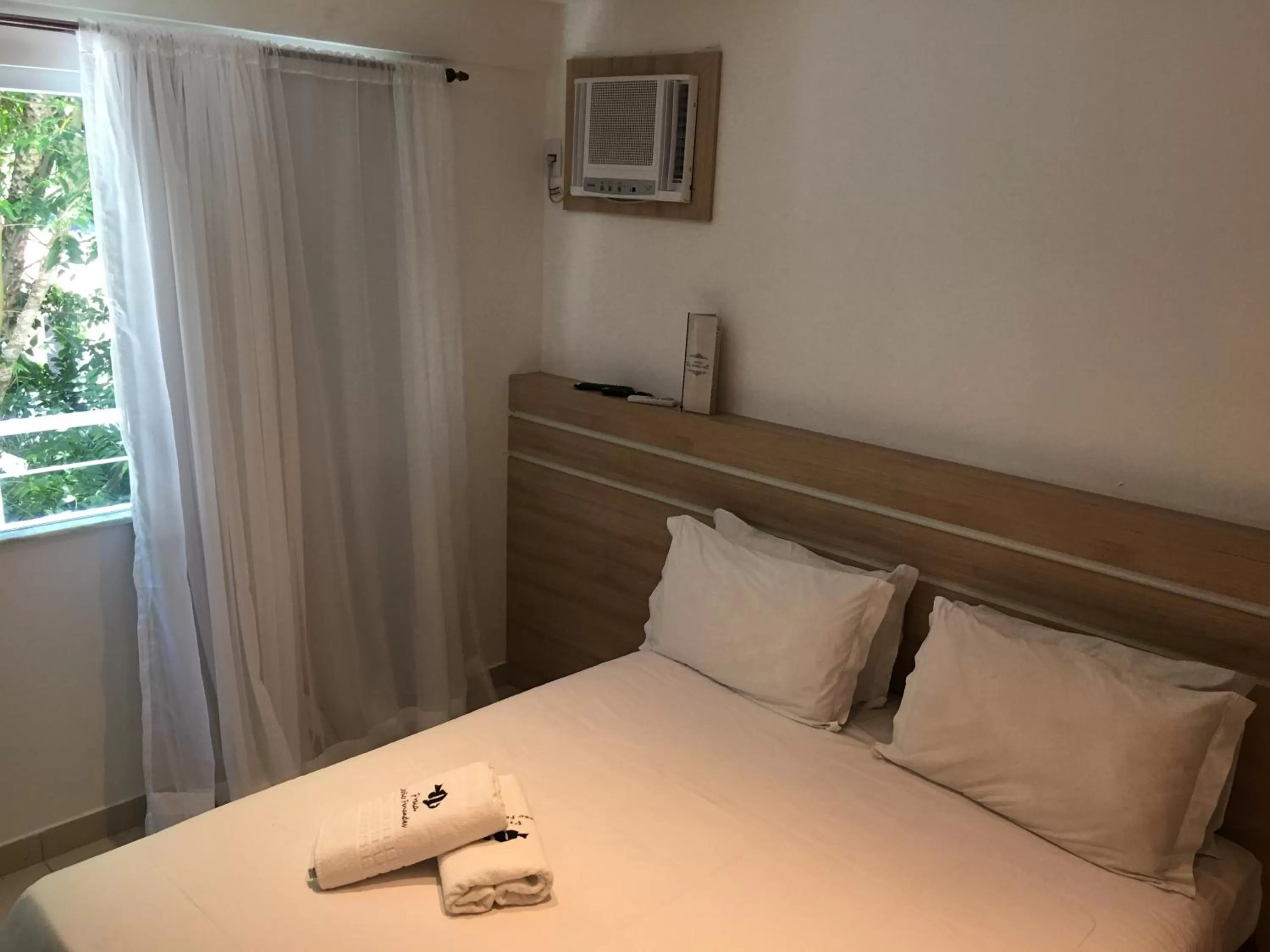 Bed in Pousada Praia João Fernandes