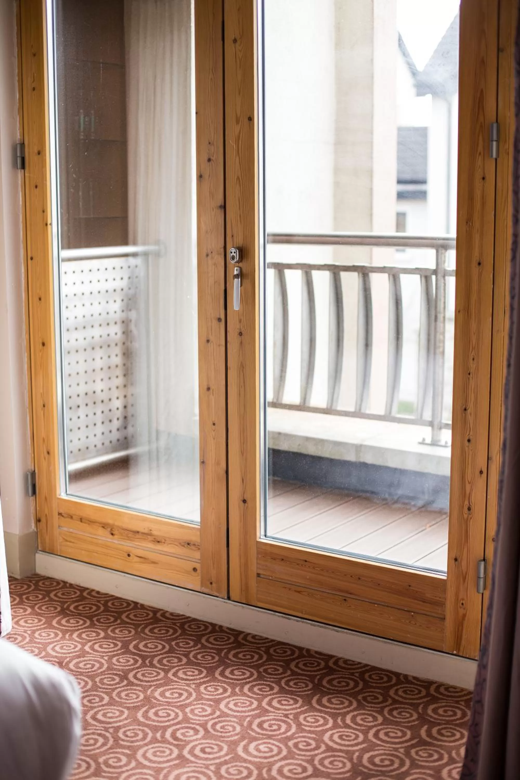 Balcony/Terrace, Bed in Osprey Hotel