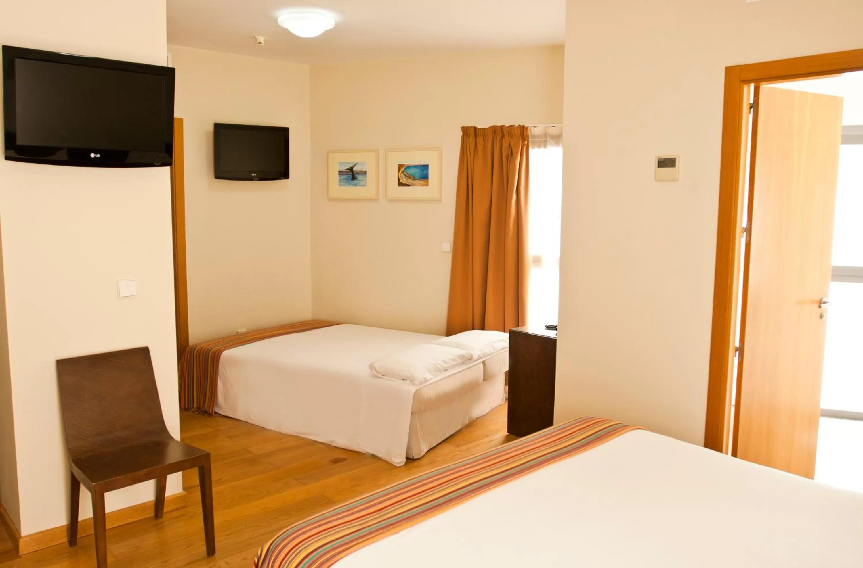 Bed in Hotel Apartamentos Patagonia Sur