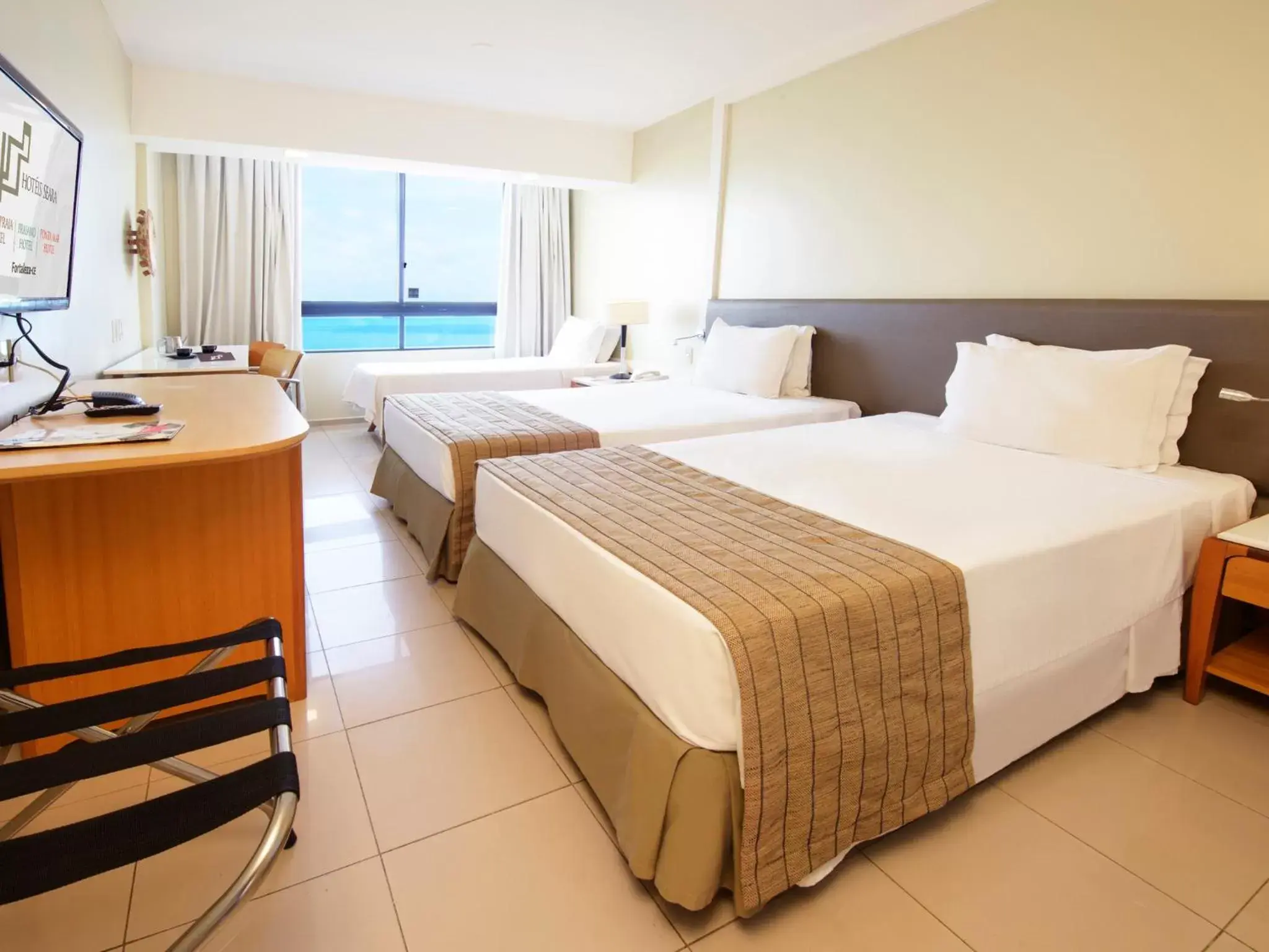 Deluxe Triple Room with Sea View in Seara Praia Hotel Deluxe Triple Room with Sea View in Seara Praia Hotel