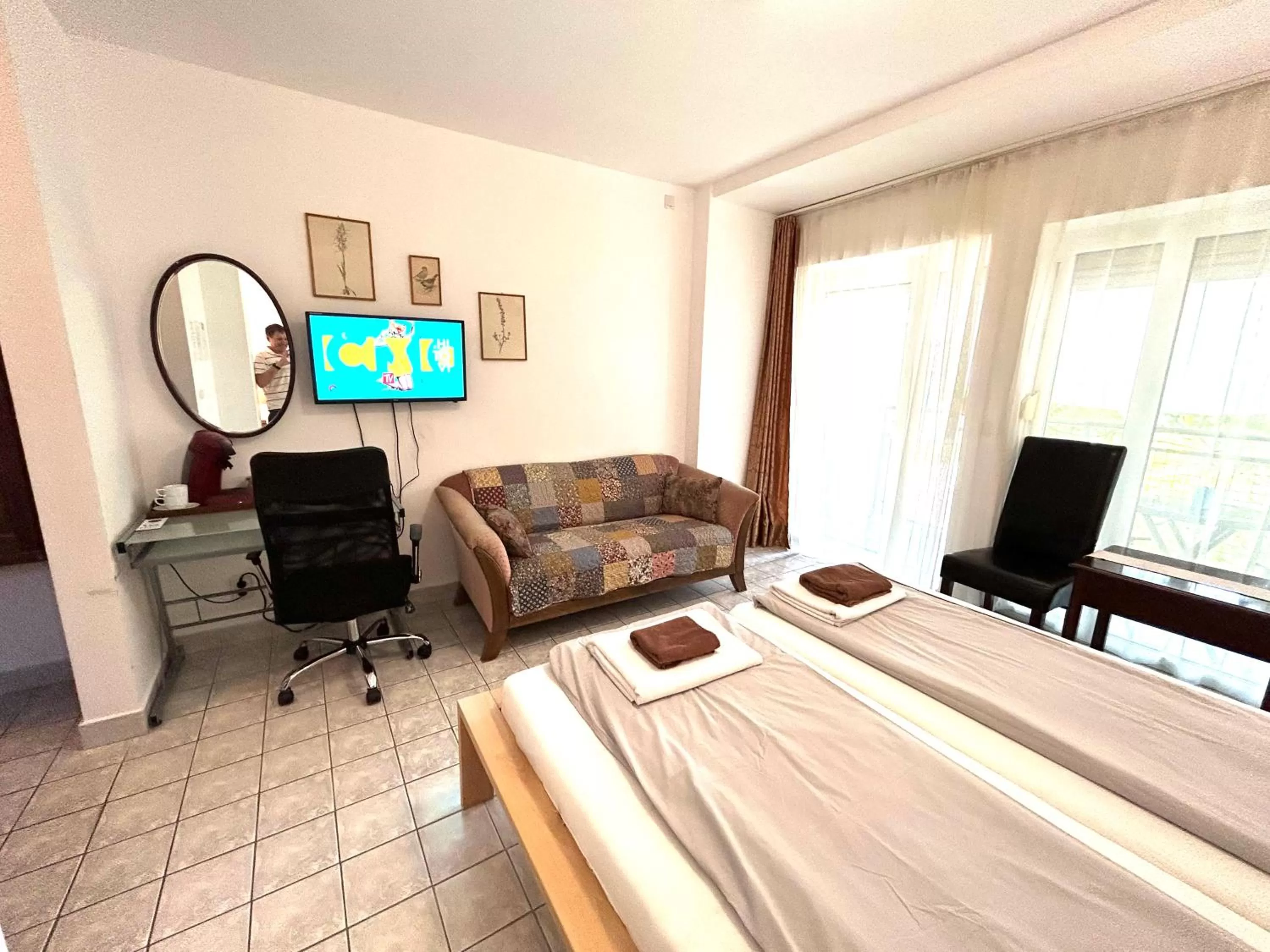 Bed, Seating Area in Pansion Vila Vanda