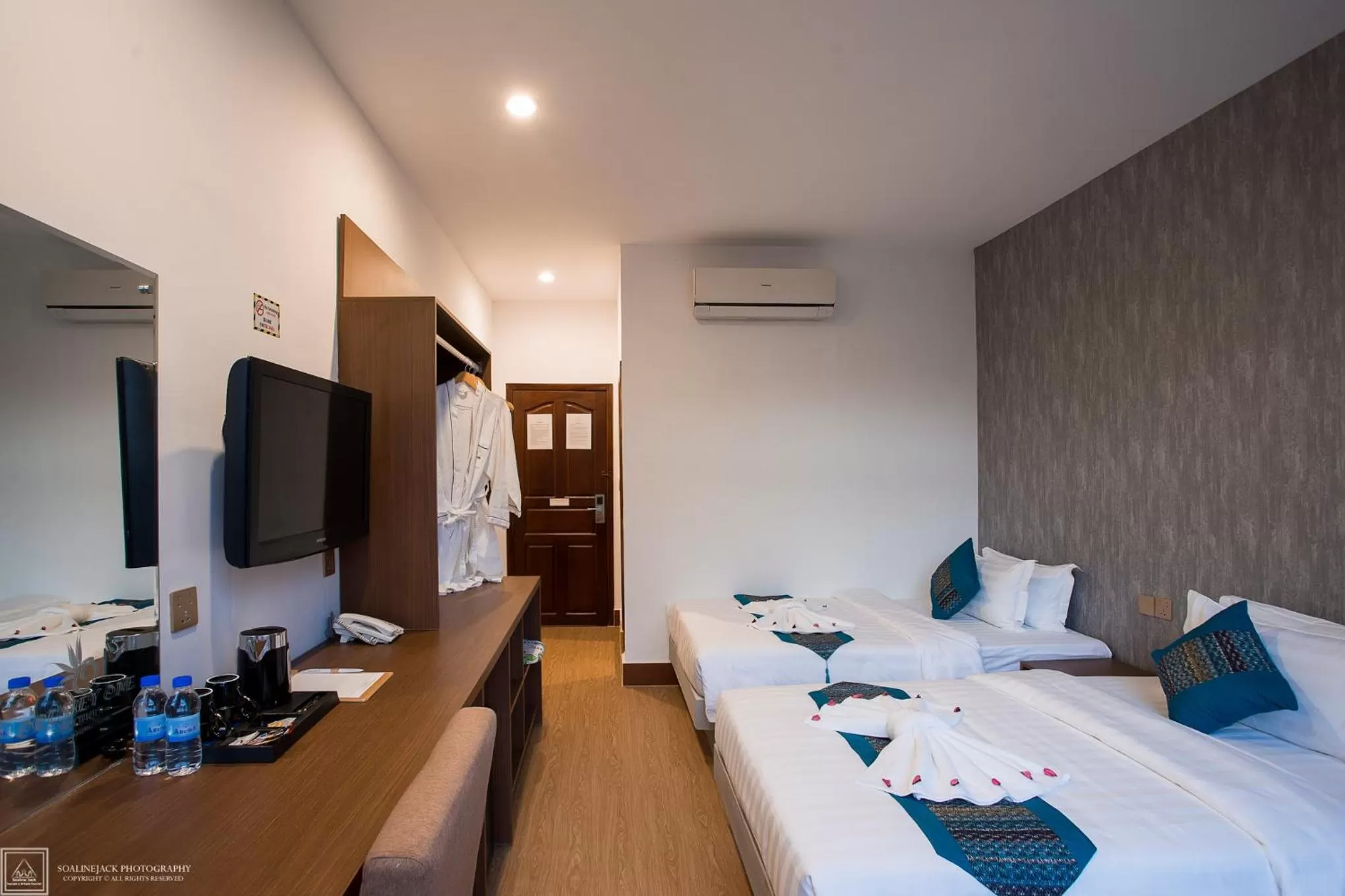 Photo of the whole room, Bed in Orussey One Boutique