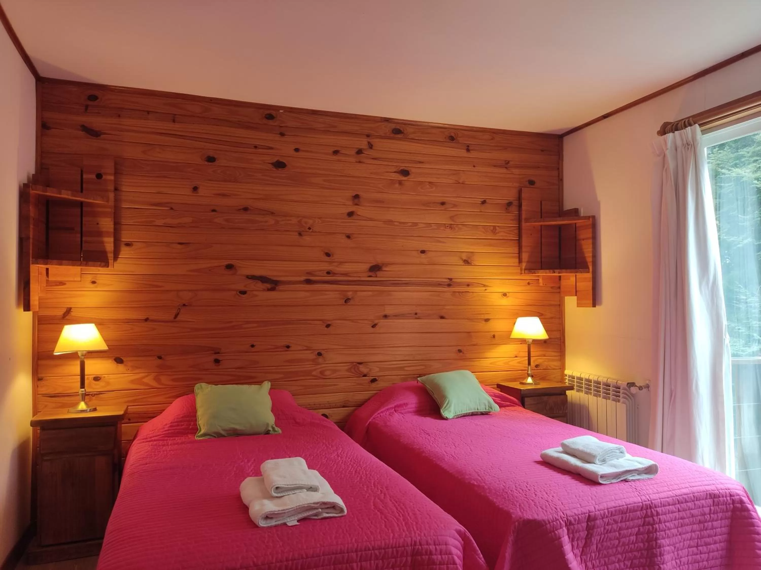 Bed in Hosteria Lekun Lekun