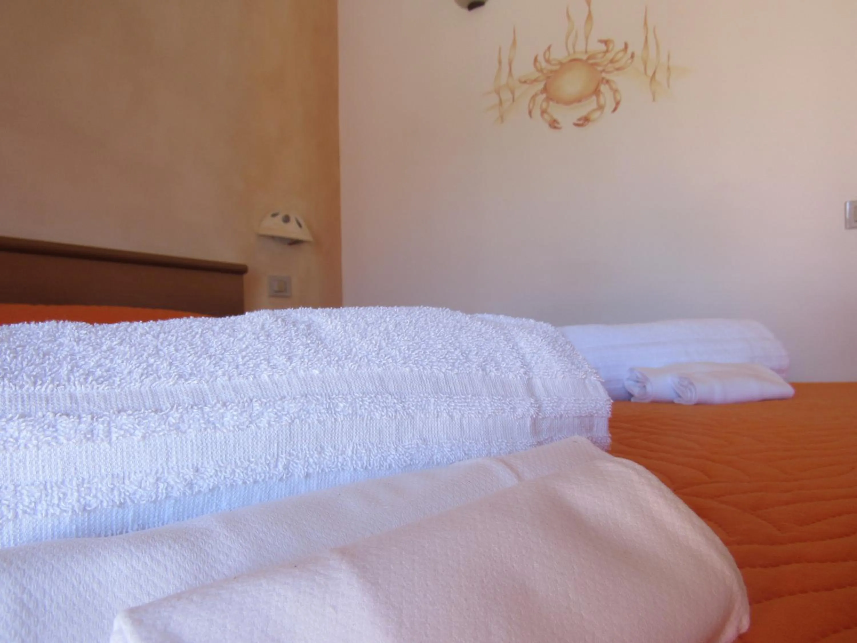 Bed in Marina Manna Hotel and Club Village