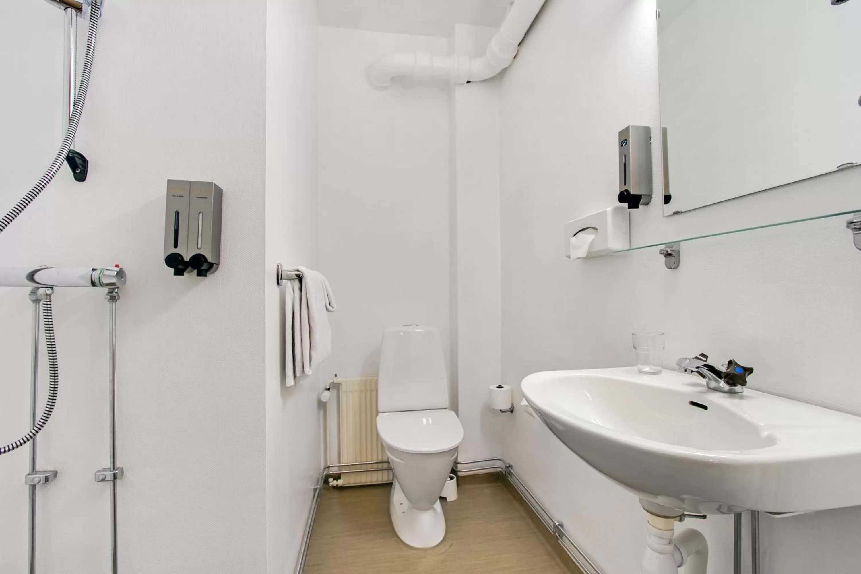 Bathroom in First Hotel Brommaplan