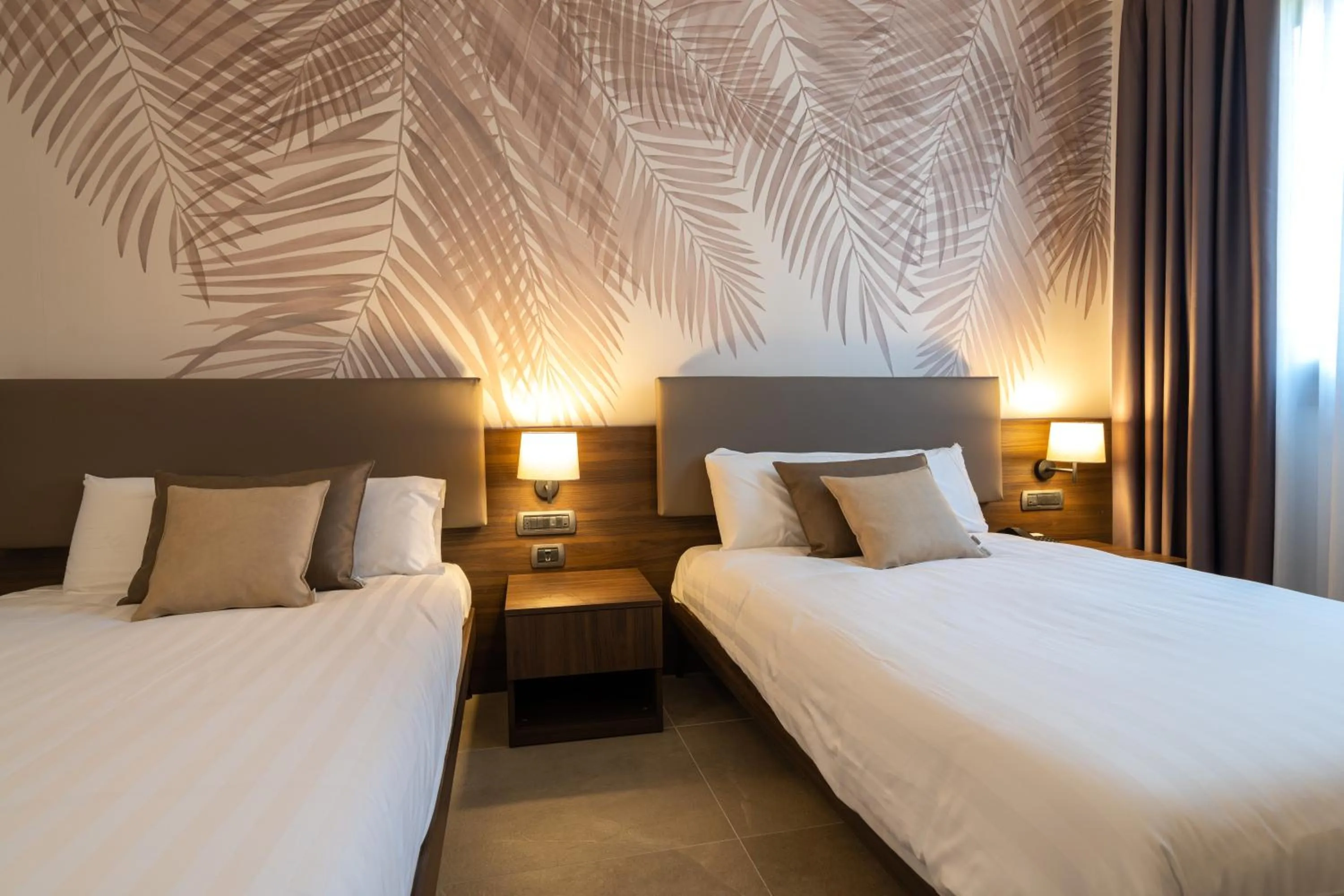 Bed in Ulivi Hotel & Residence