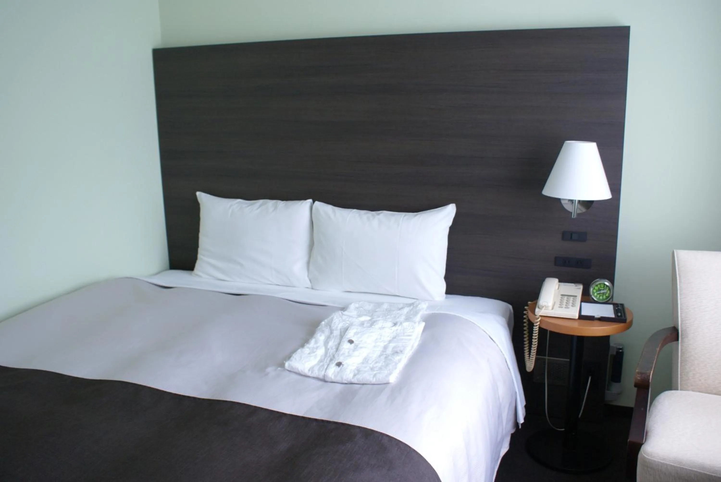 Bed in Ginza Grand Hotel