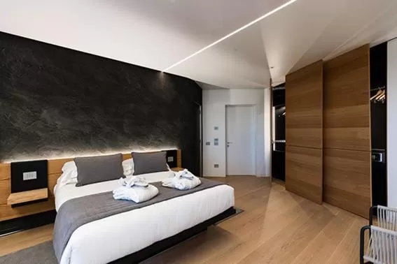 Bed in Borgo San Barbato Resort Spa & Golf