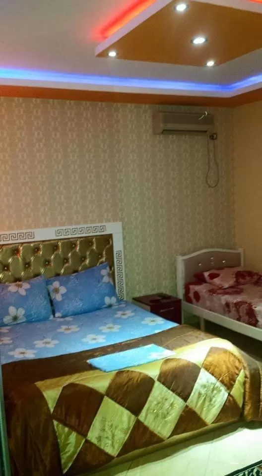 Bed in Hotel Buza
