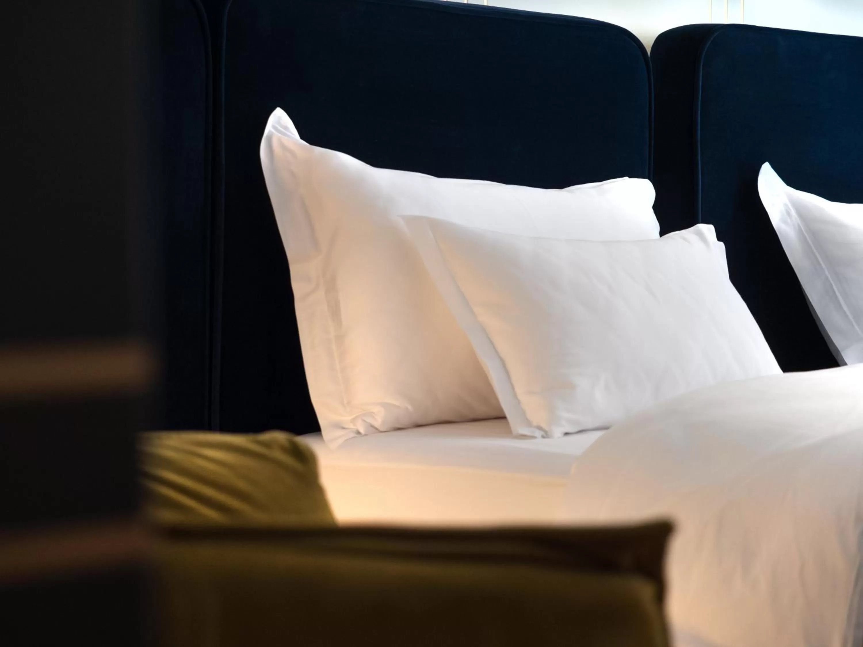 Bed in Moncafe BoutiqueHotel Spa