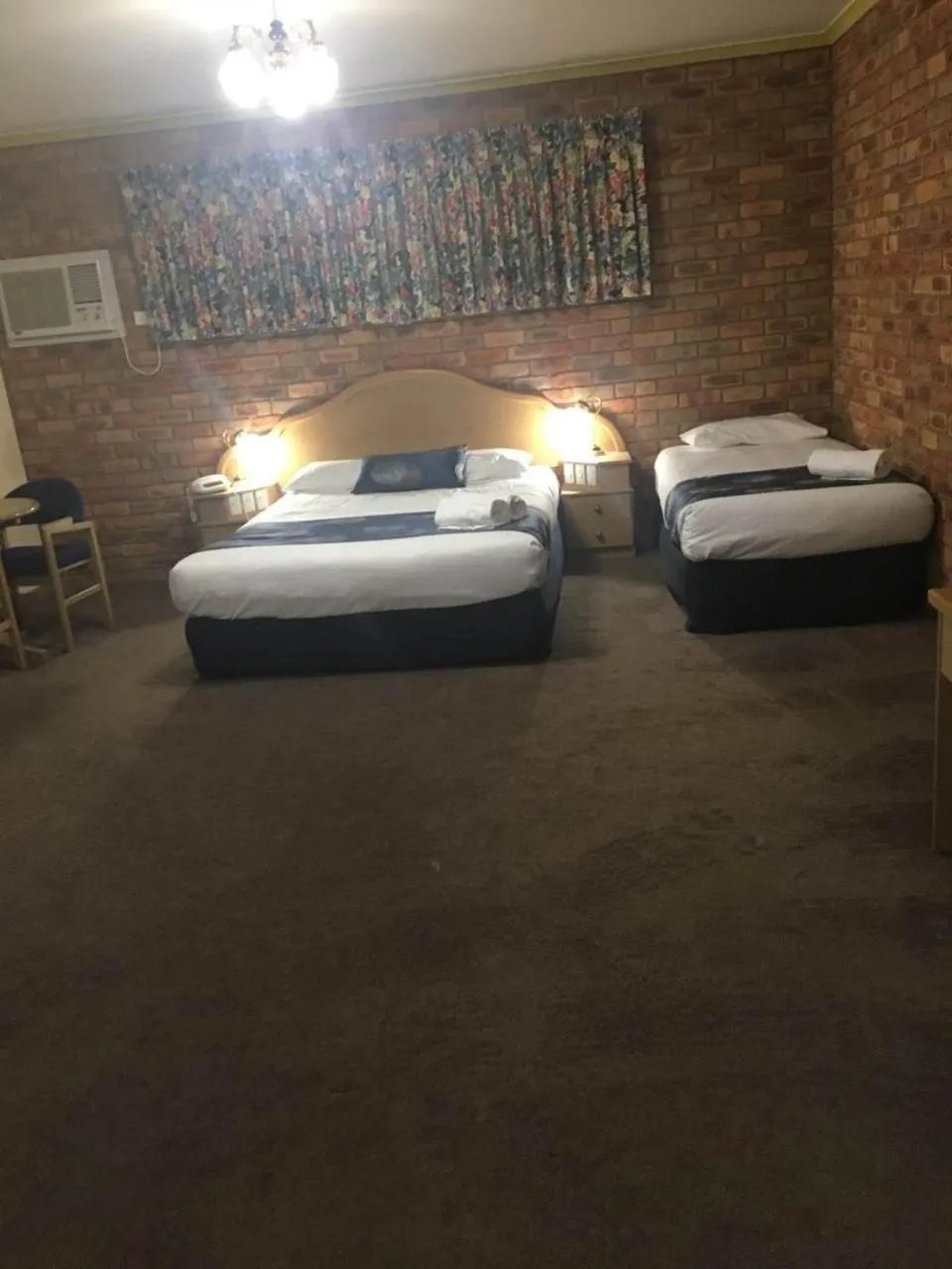 Bed in Pines Country Club Motor Inn