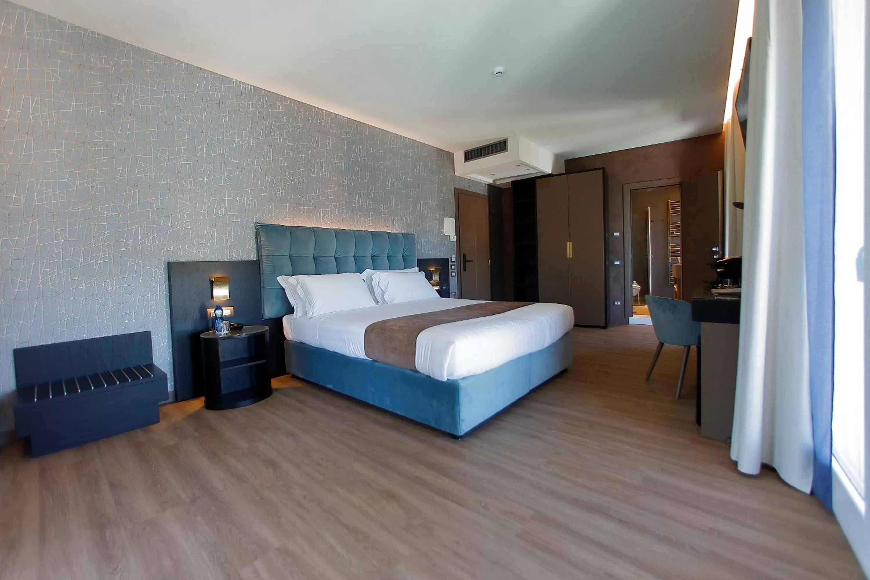 Bed in Hotel Bell'arrivo by Dori