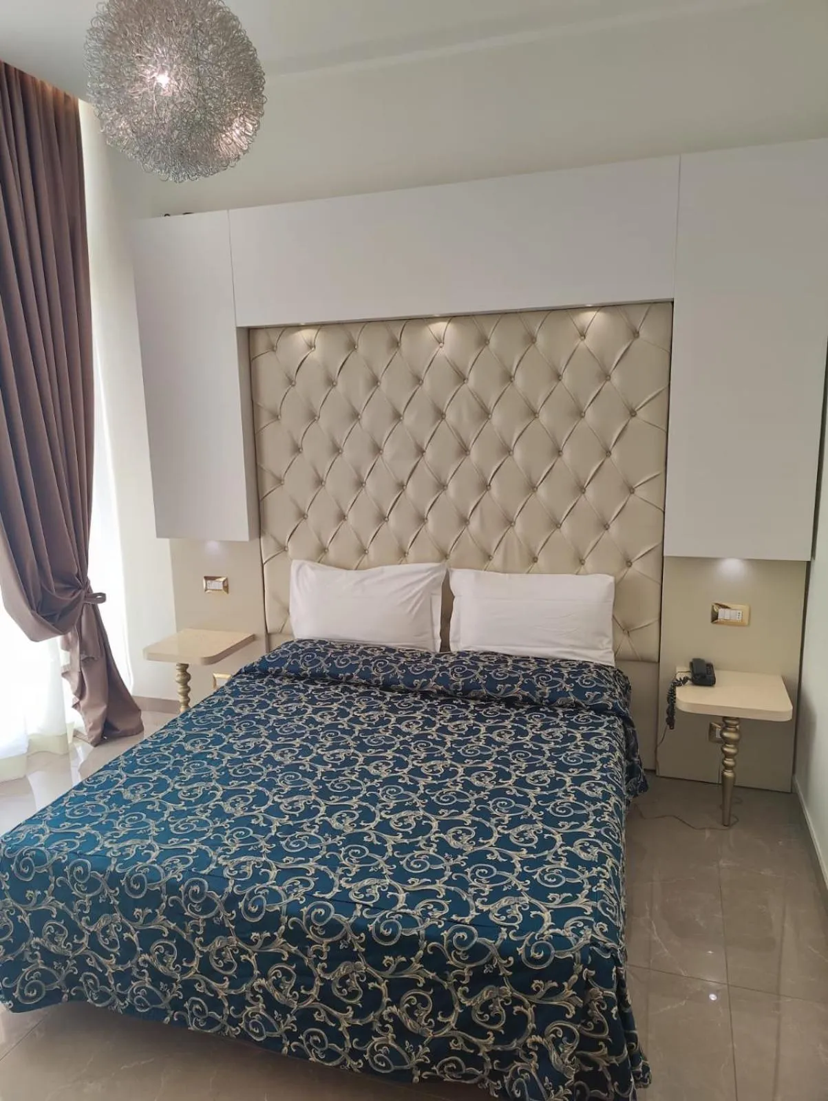 Bed in Hotel Ambassador