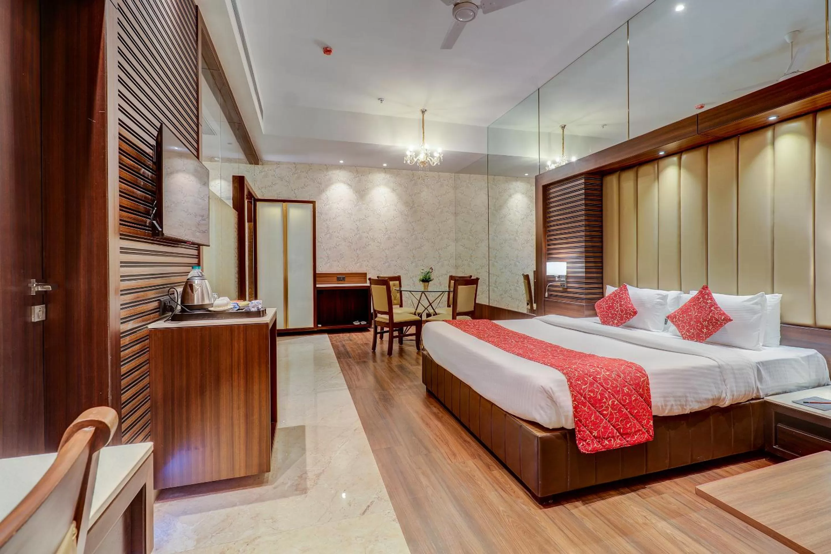 Communal lounge/ TV room, Bed in Hotel Gurudev Grand