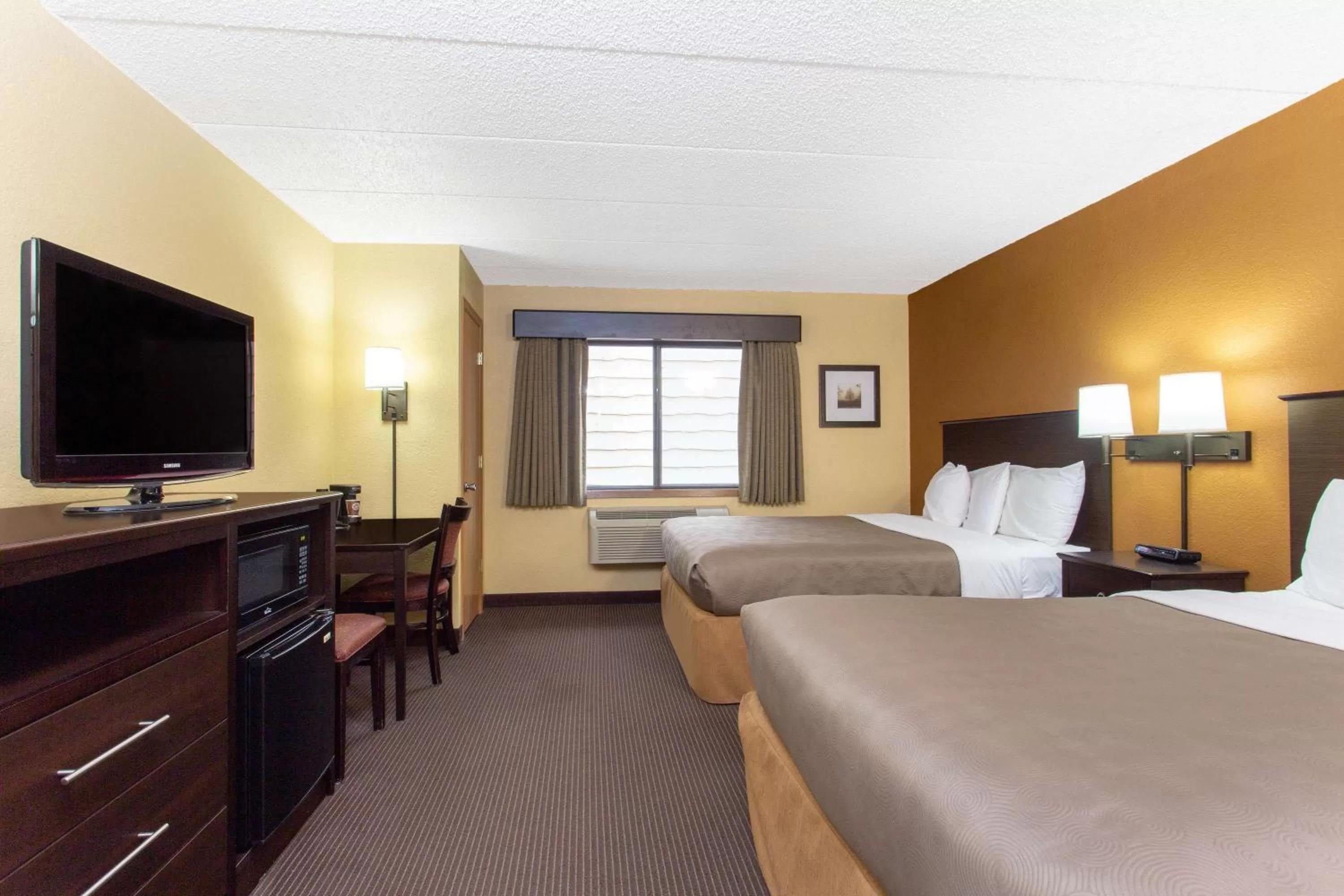 Photo of the whole room, Bed in AmericInn by Wyndham West Bend