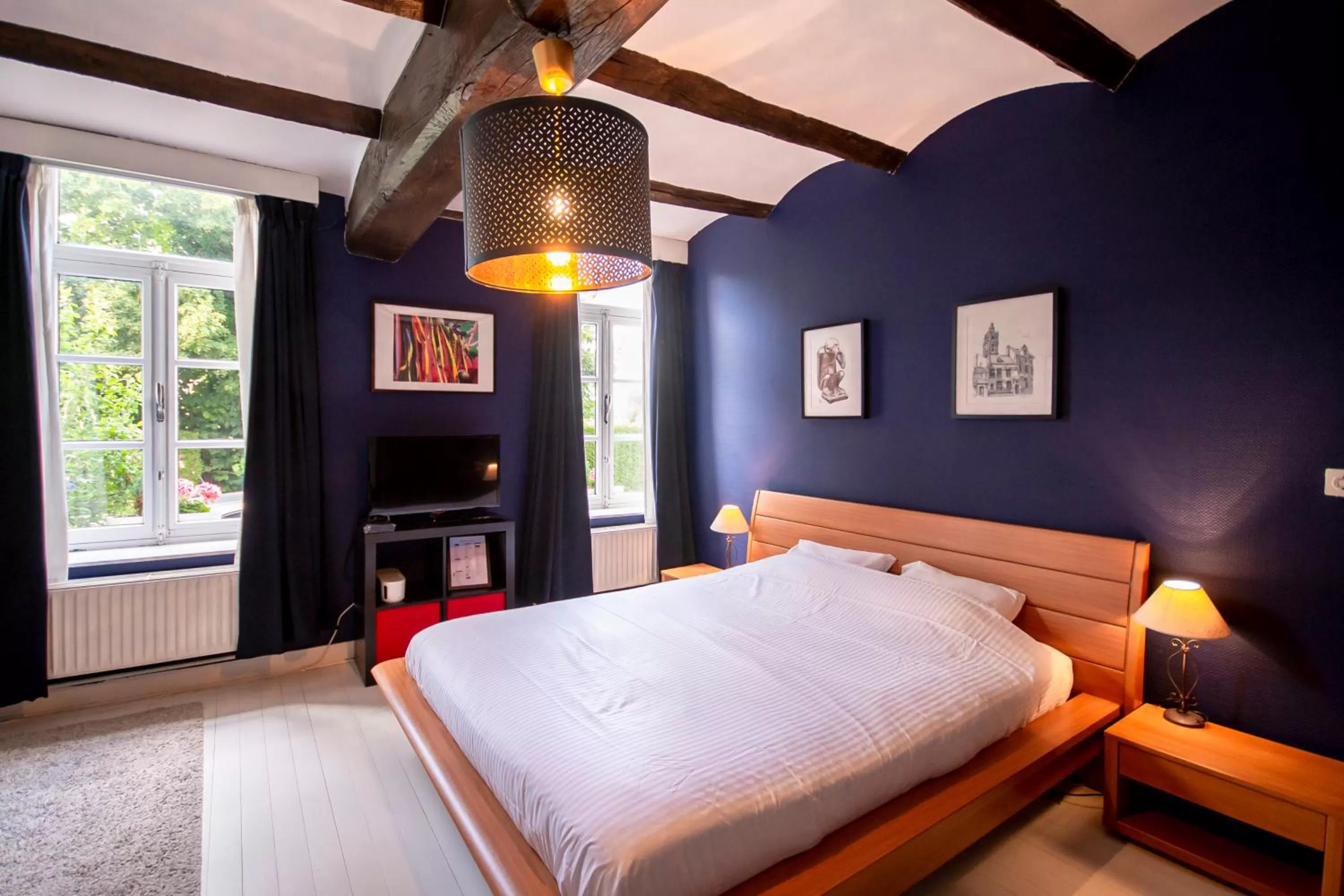 Bed in Au Petit Dragon