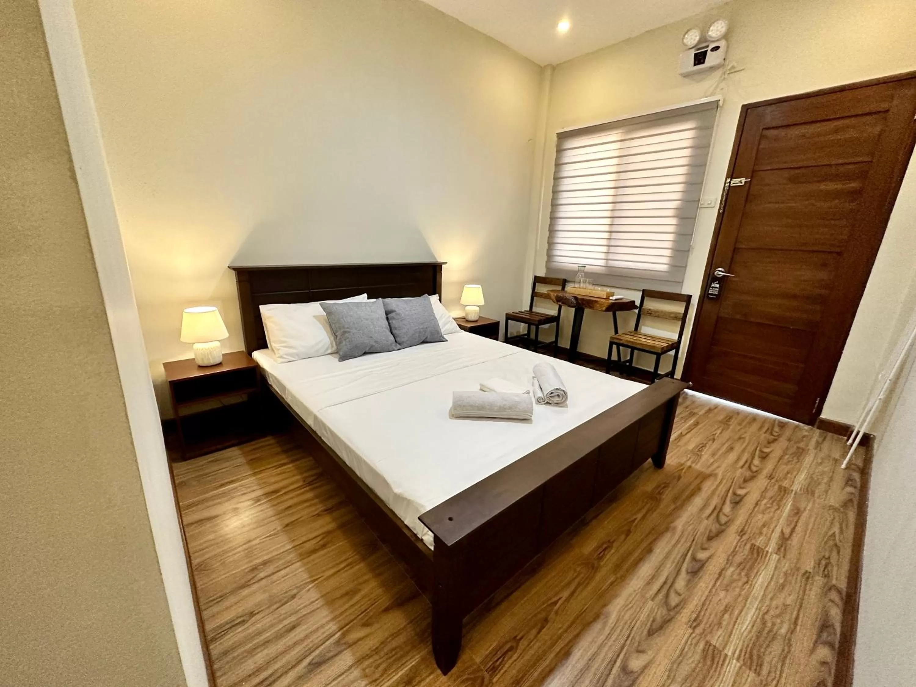 Bed in Harbour Bliss Hotel