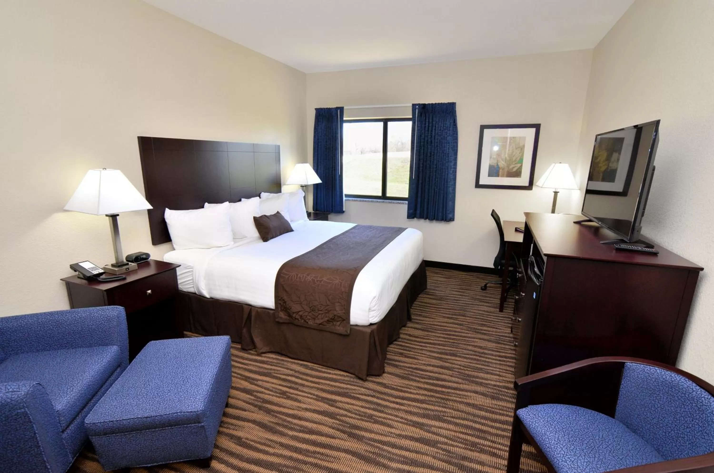 Bed in Cobblestone Inn & Suites - Manning