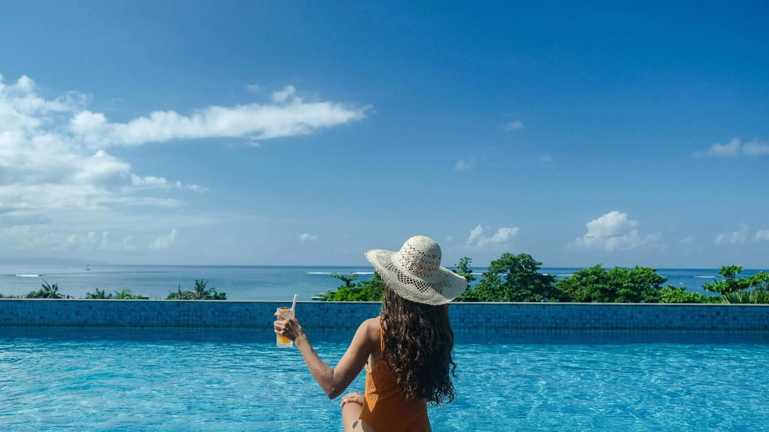 Swimming pool in Holiday Inn Bali Sanur by IHG