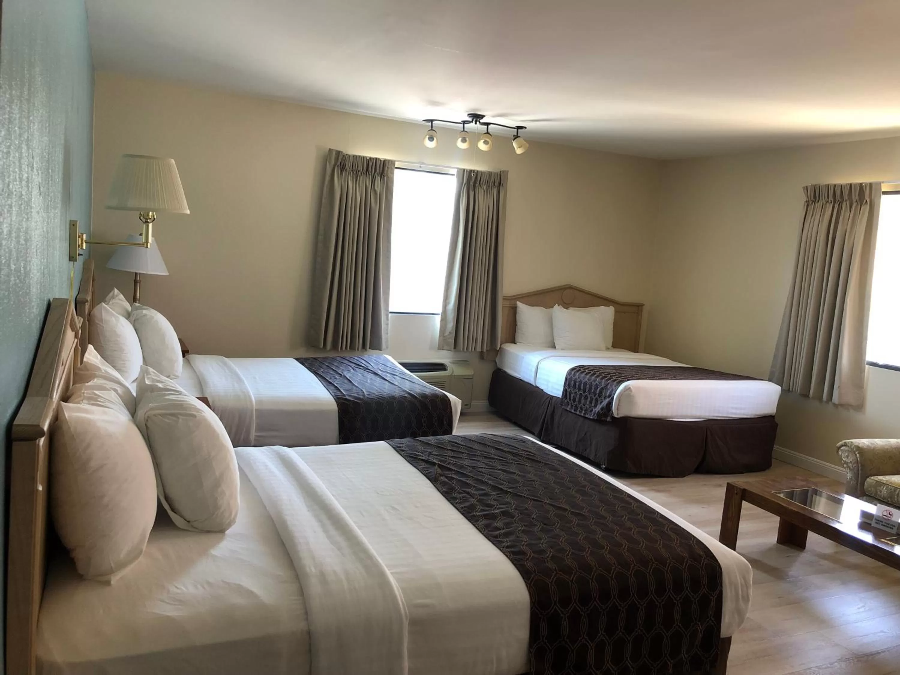 Bed in Rotex Western Inn