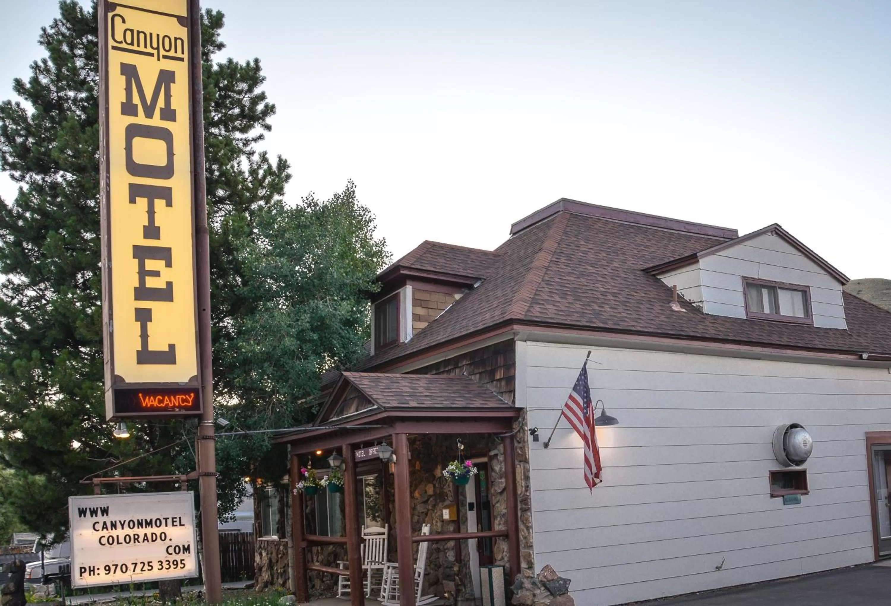 Property logo or sign in Canyon Motel near Rocky Mountain National Park