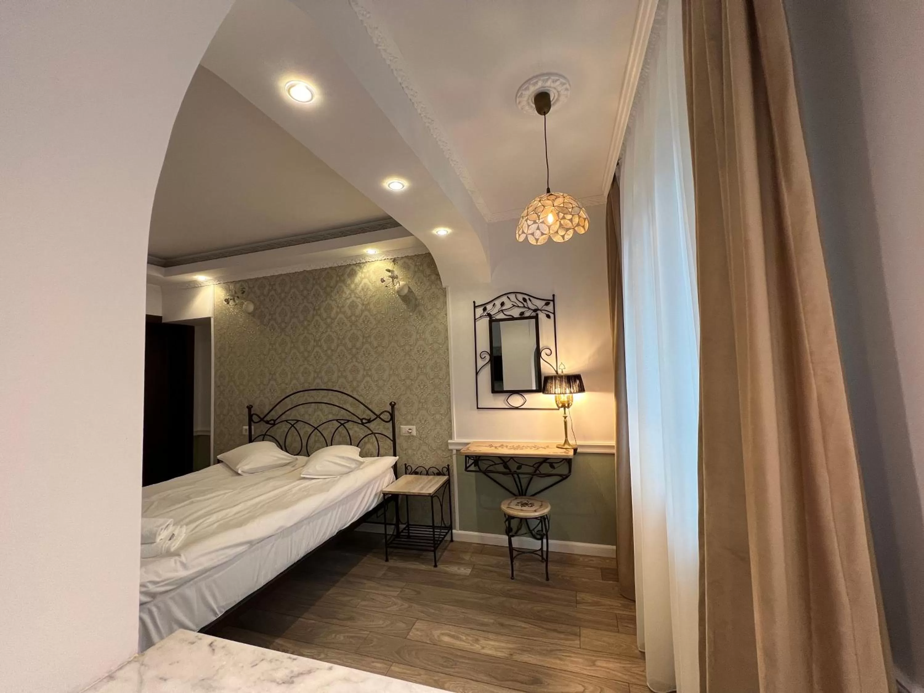 Bed in Hotel Boutique Cathedral Plaza Residences room for rent downtown