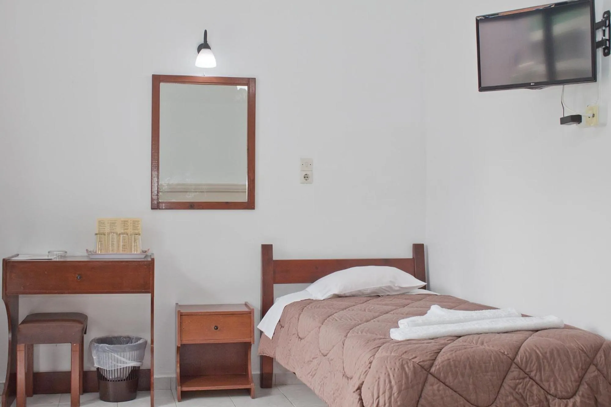 Photo of the whole room, Bed in Danaos Hotel