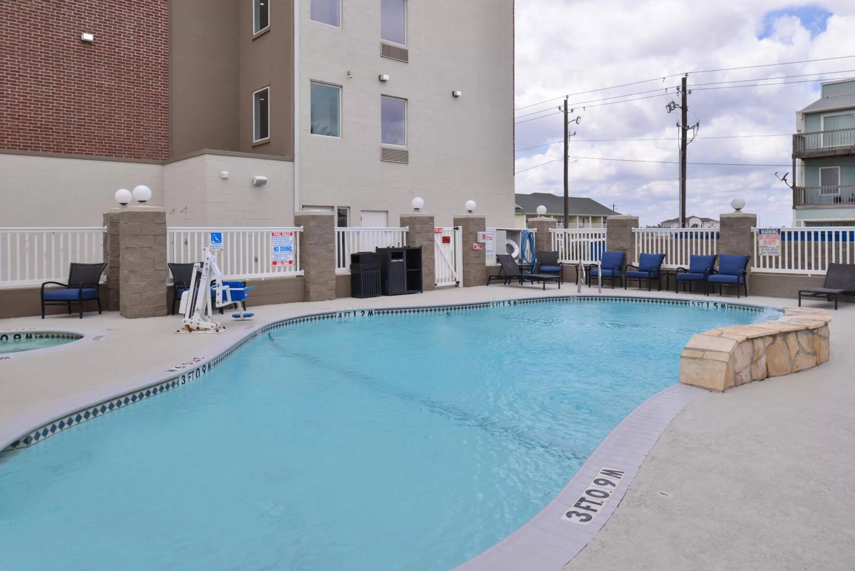 Swimming pool in Holiday Inn Express & Suites Corpus Christi-N Padre Island by IHG