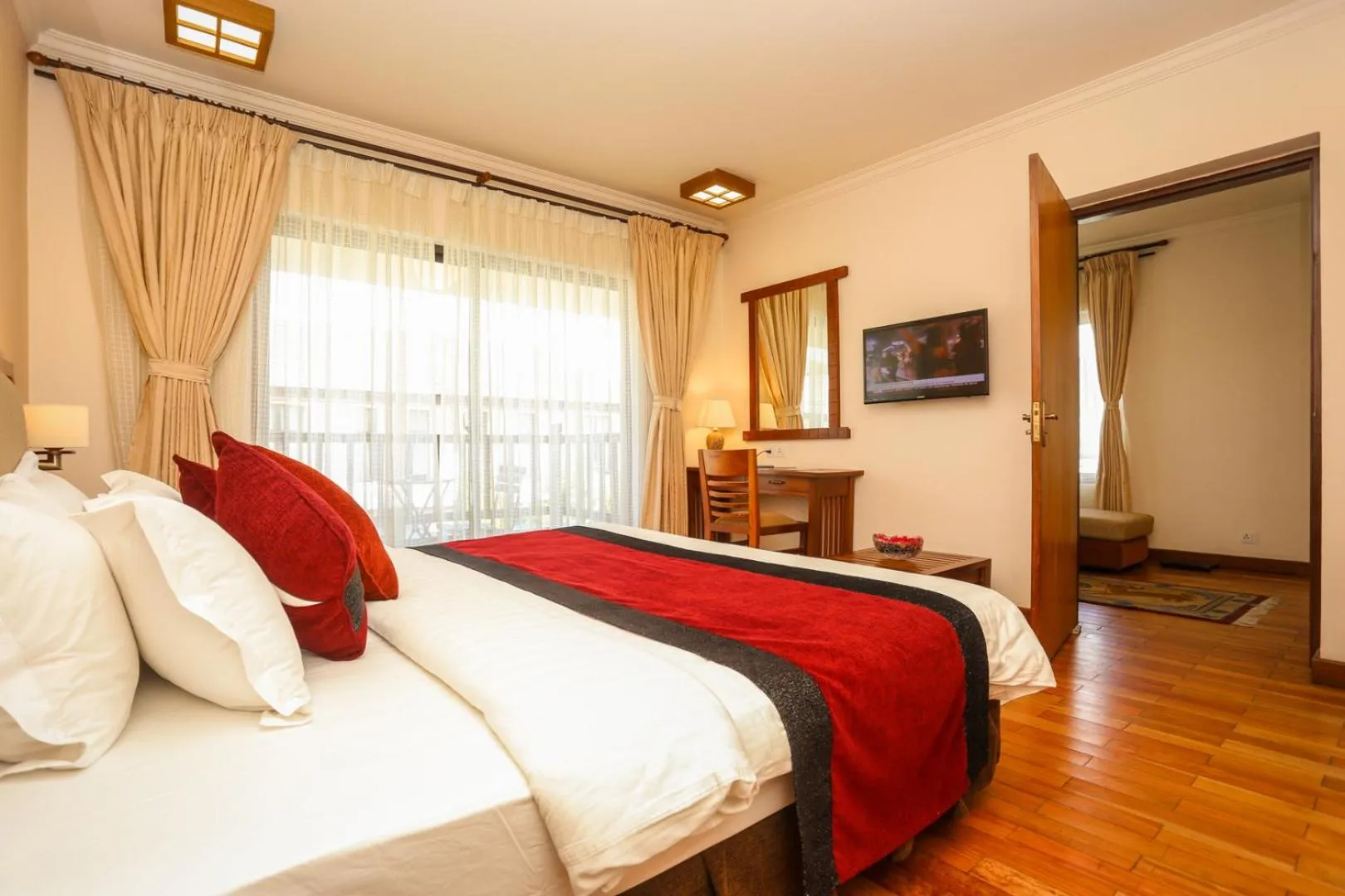 Bed in Atithi Resort & Spa