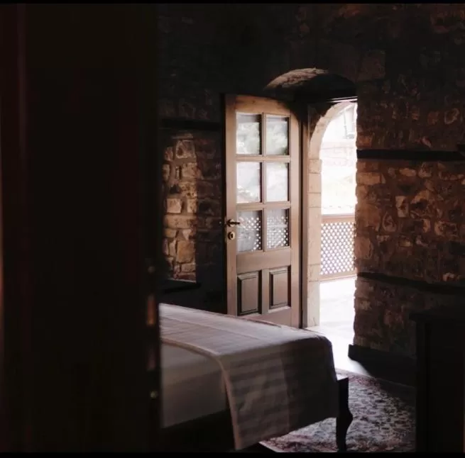 Bed in Beratino Hotel