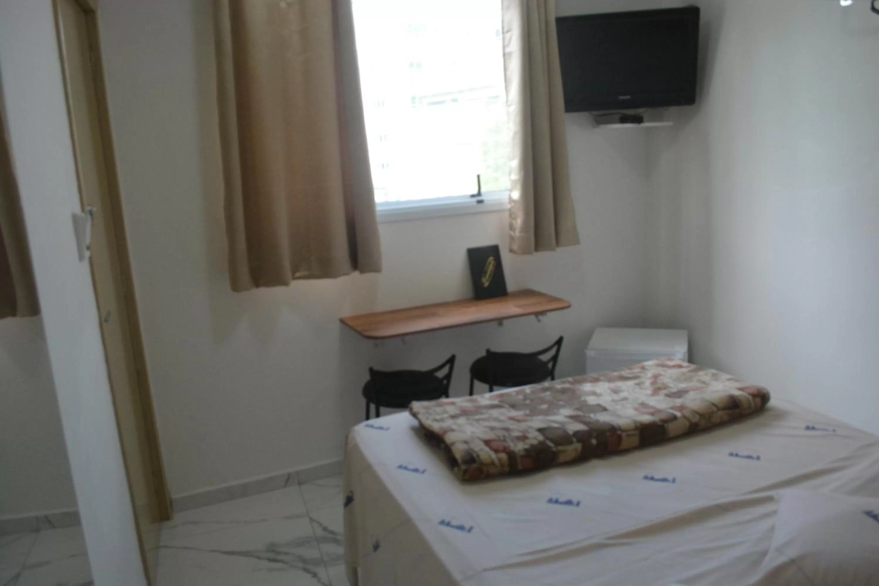 Bed in New Point Hotel